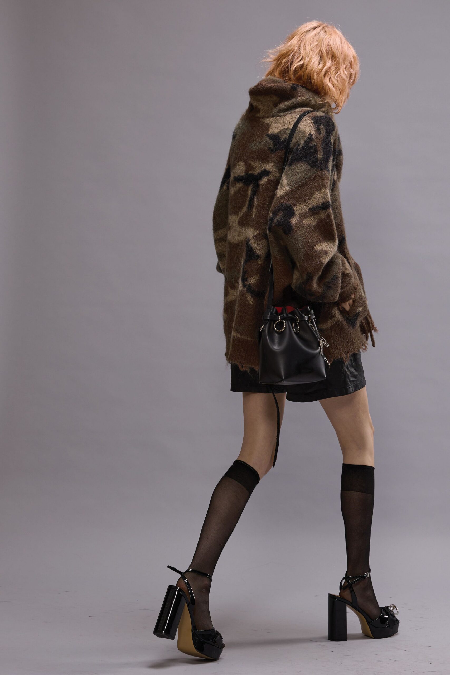 oversized camouflage sweater with denim skirt