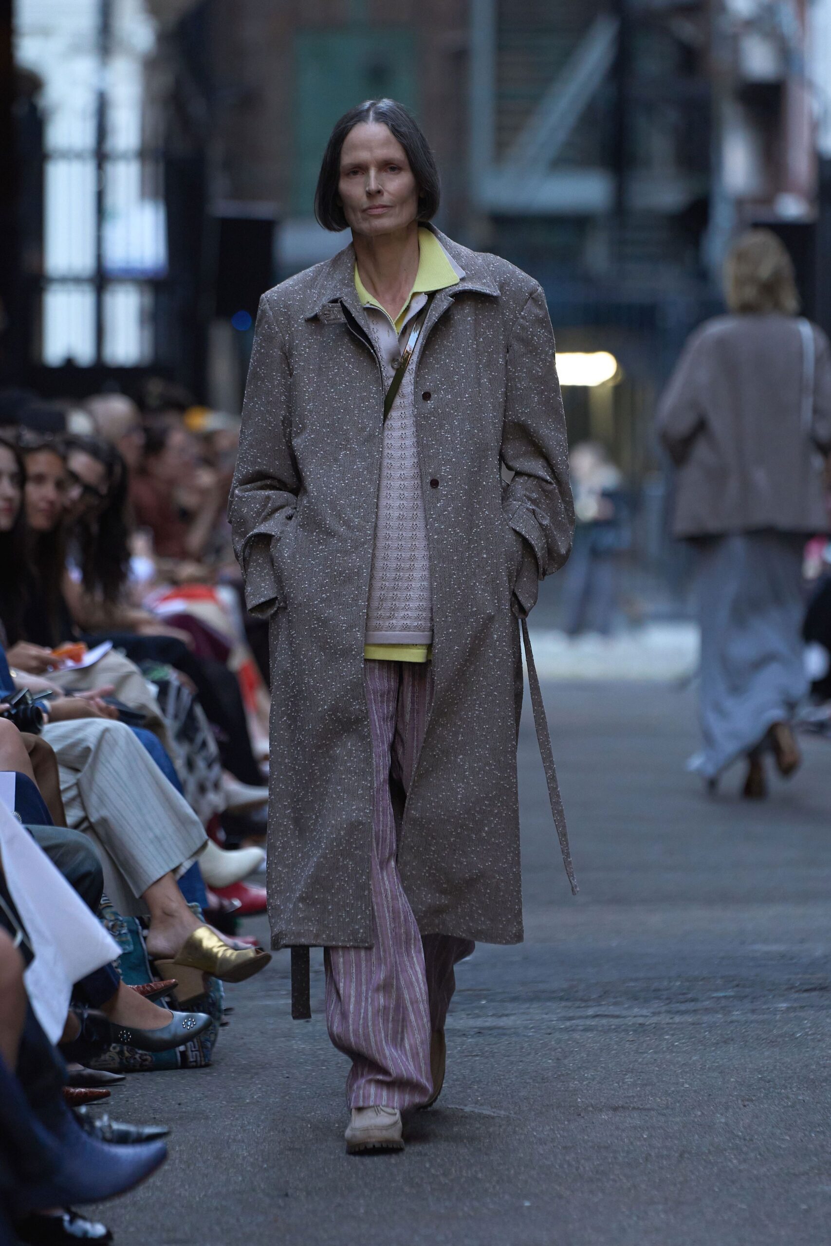 gray coat with striped pants