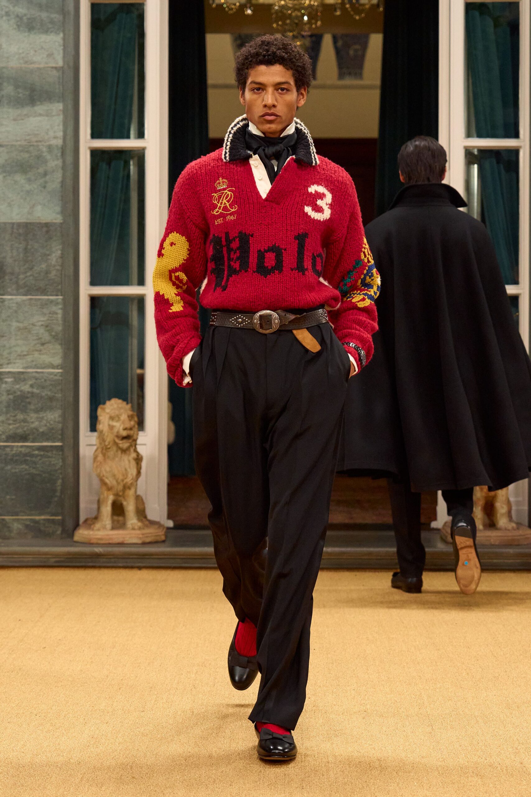 red wool sweater with black pants