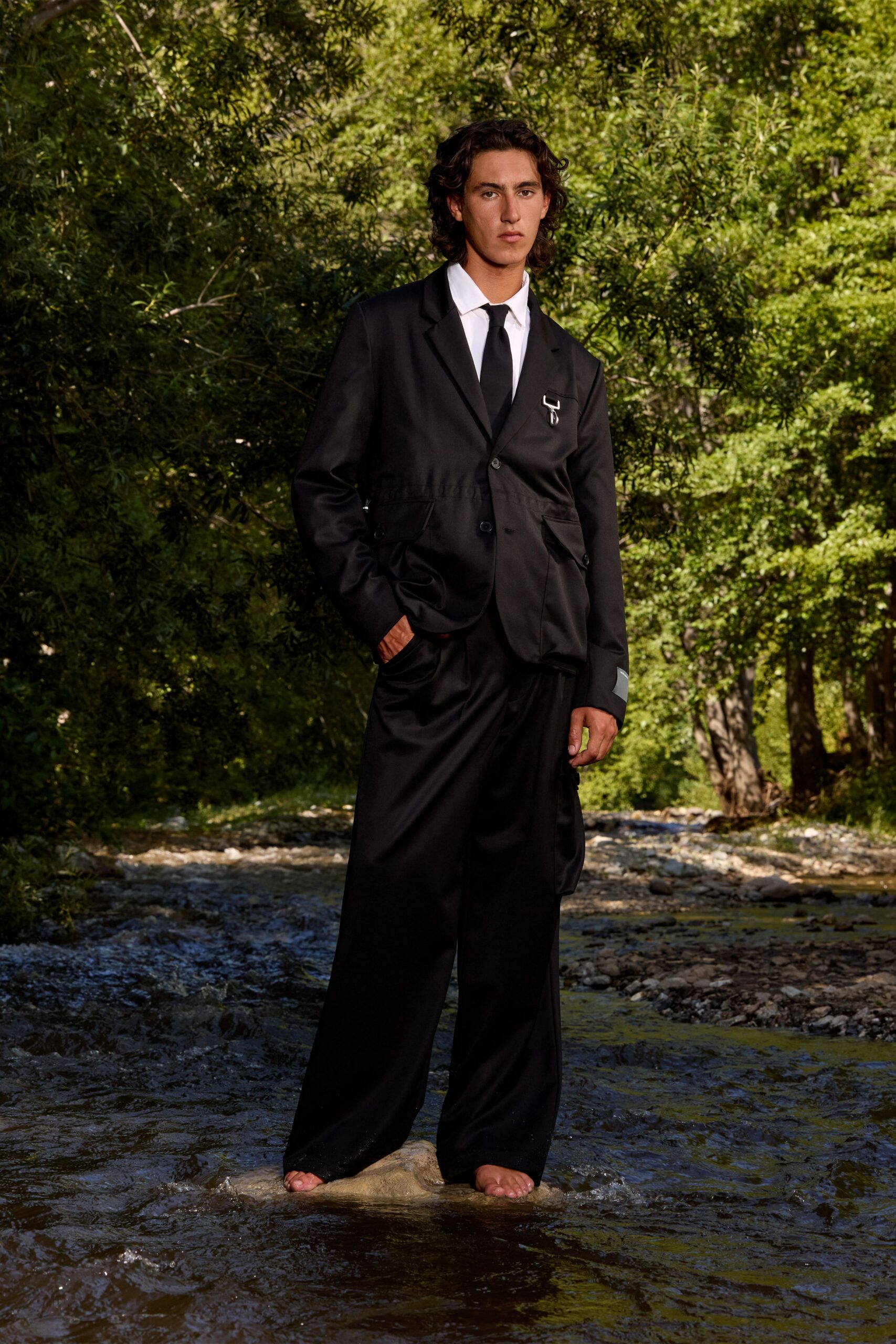 black cotton long-sleeve collared relaxed buttoned suit