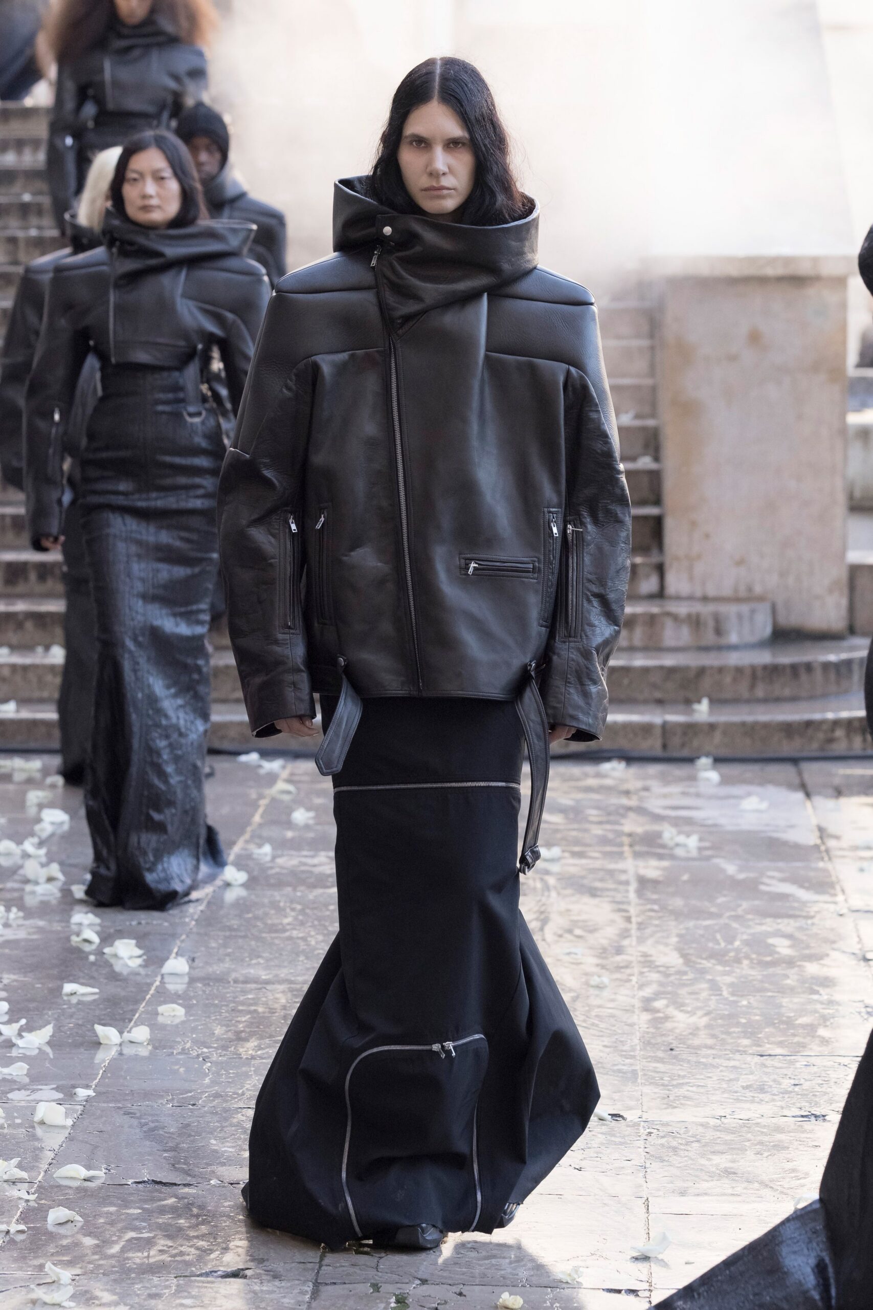 black leather oversized jacket and fitted skirt