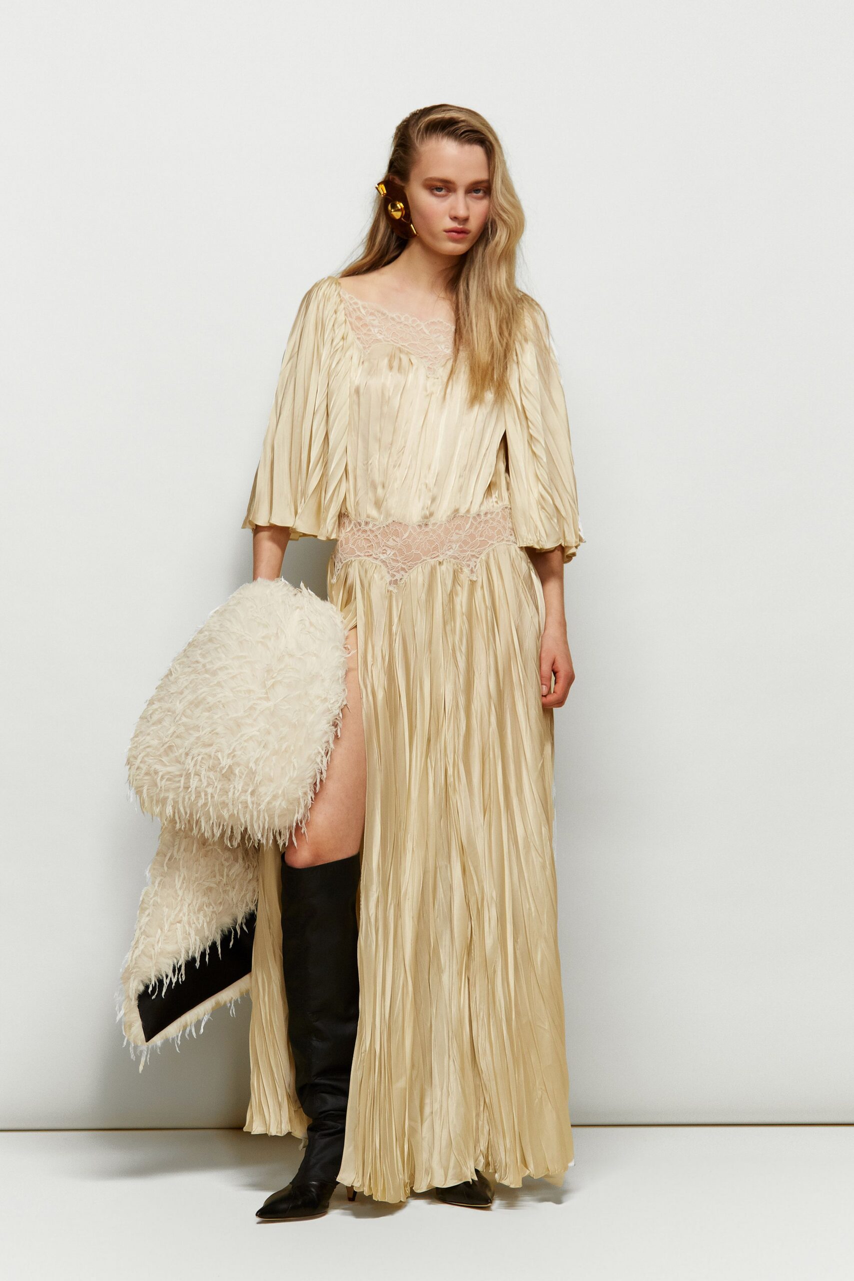 beige silk long-sleeve v-neck relaxed pleated flowing gown