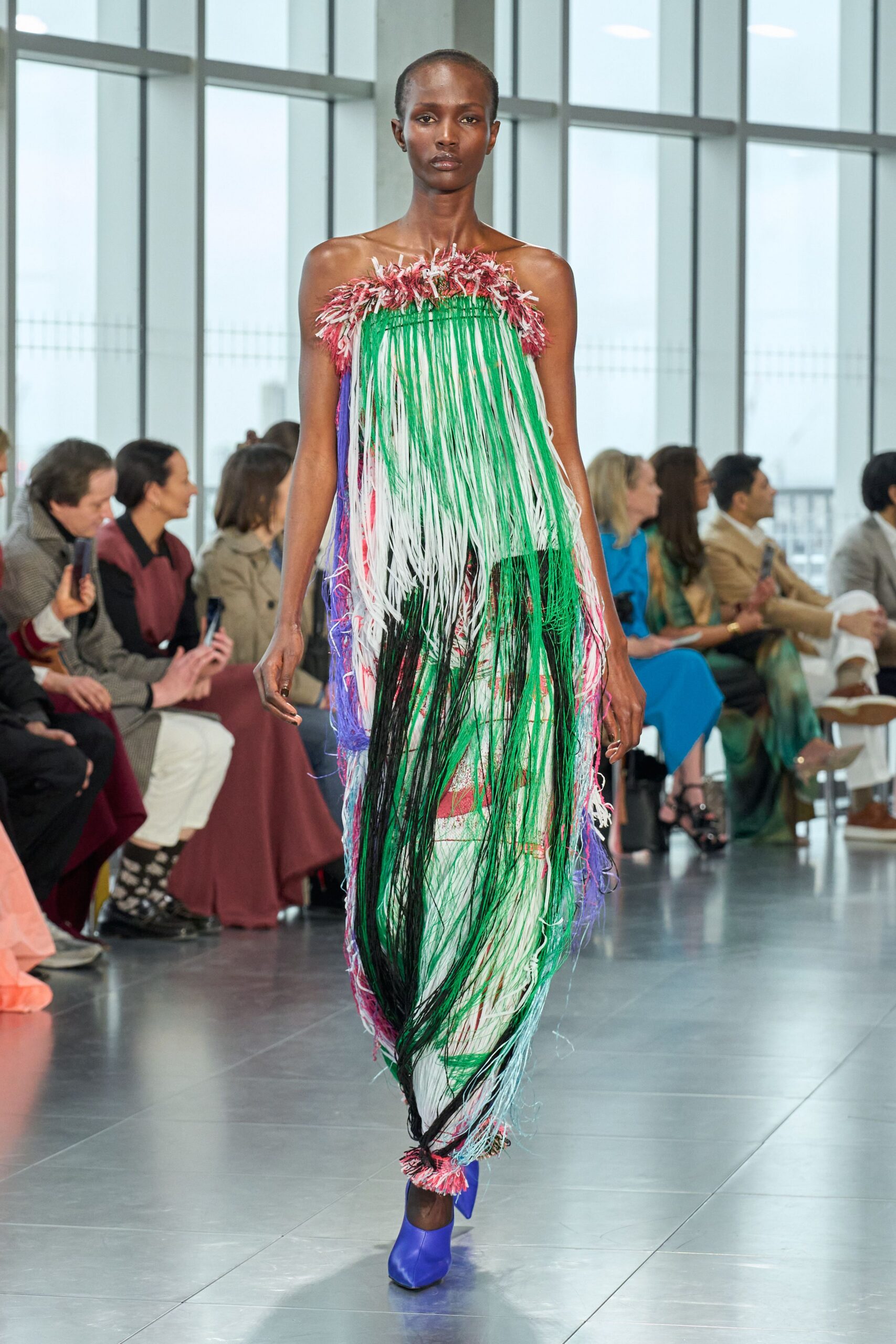 multi-colored fringed midi dress with blue shoes