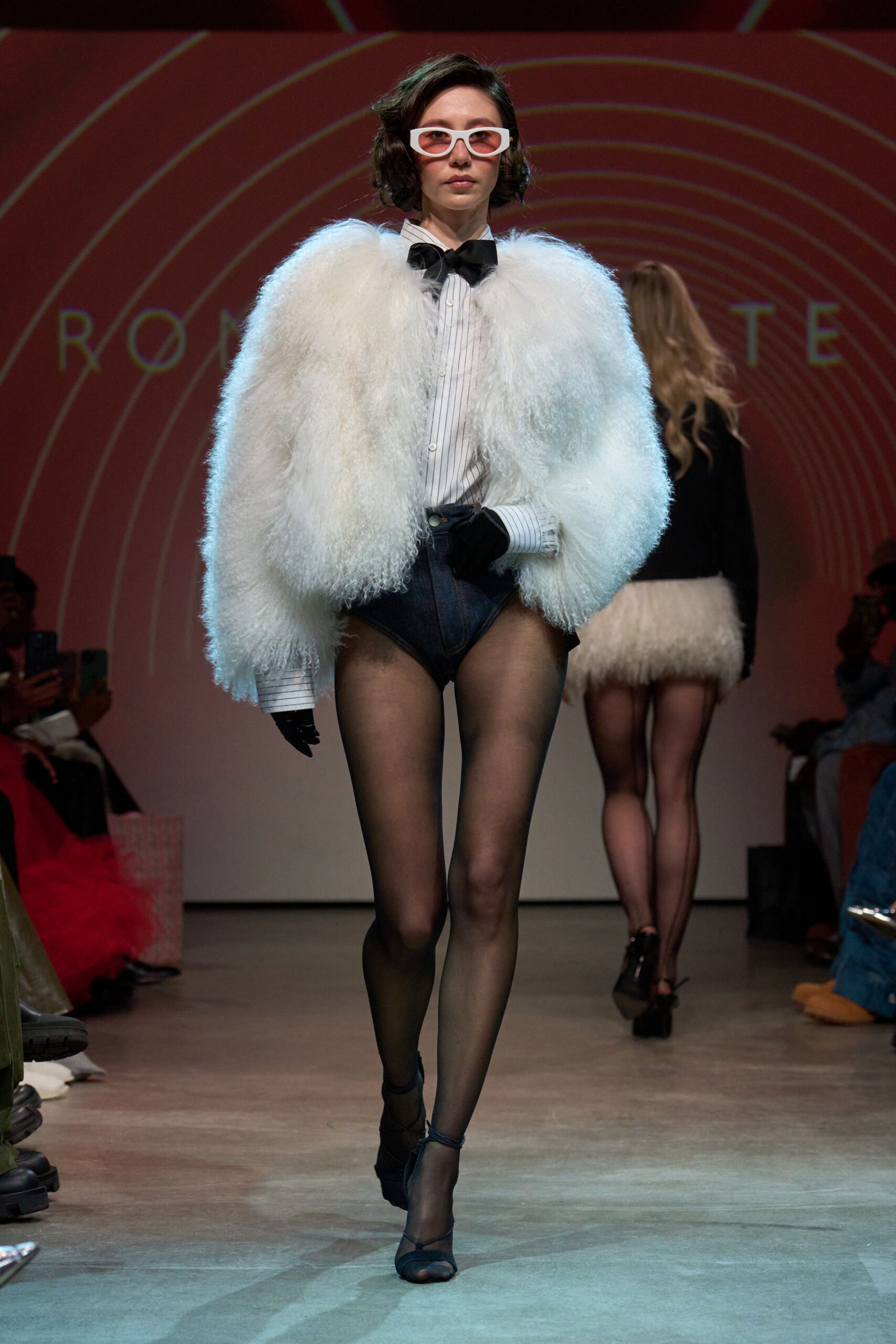 white fur coat with denim shorts