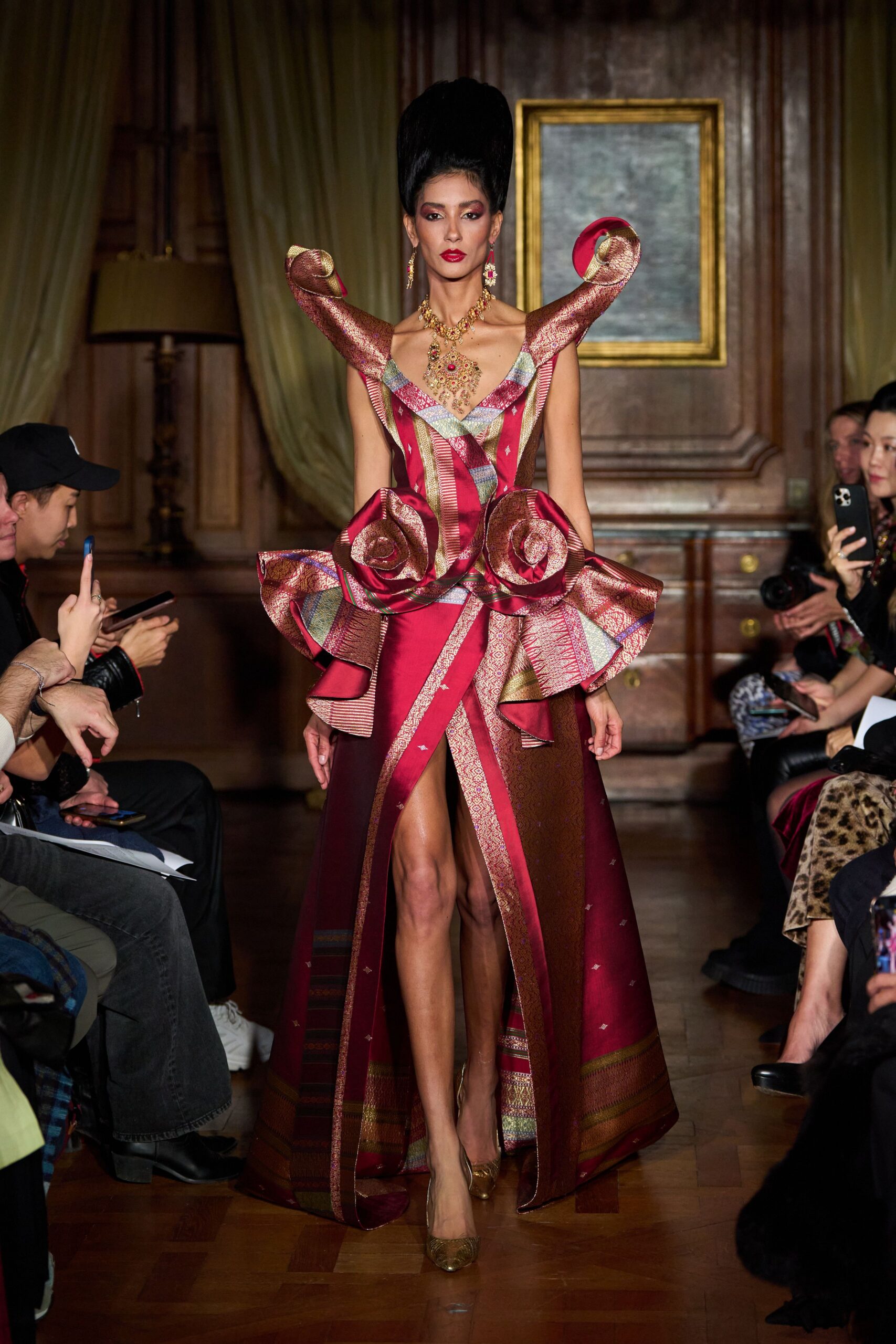 red silk sleeveless v-neck fitted pleated draped gown