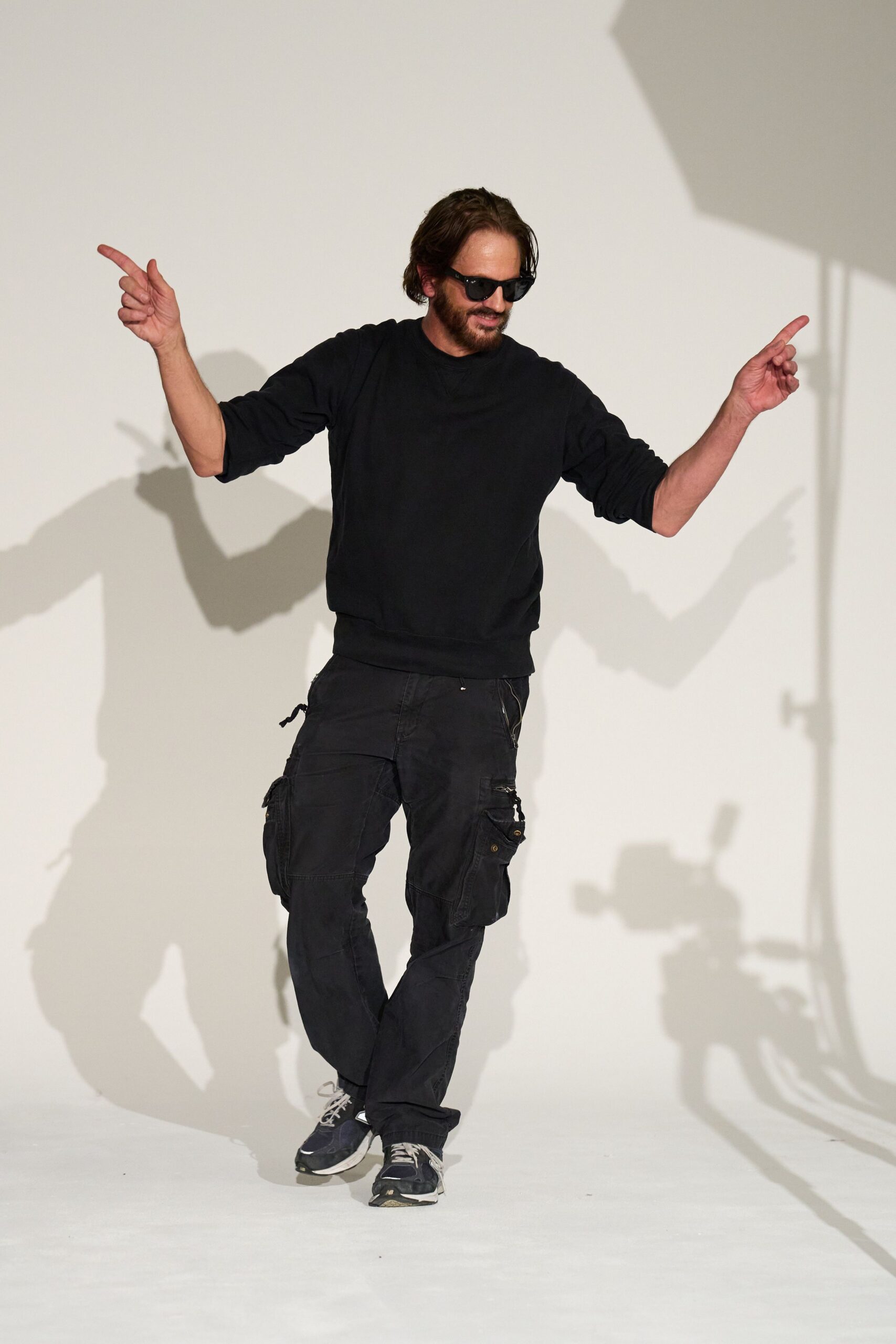 black relaxed sweater and cargo pants