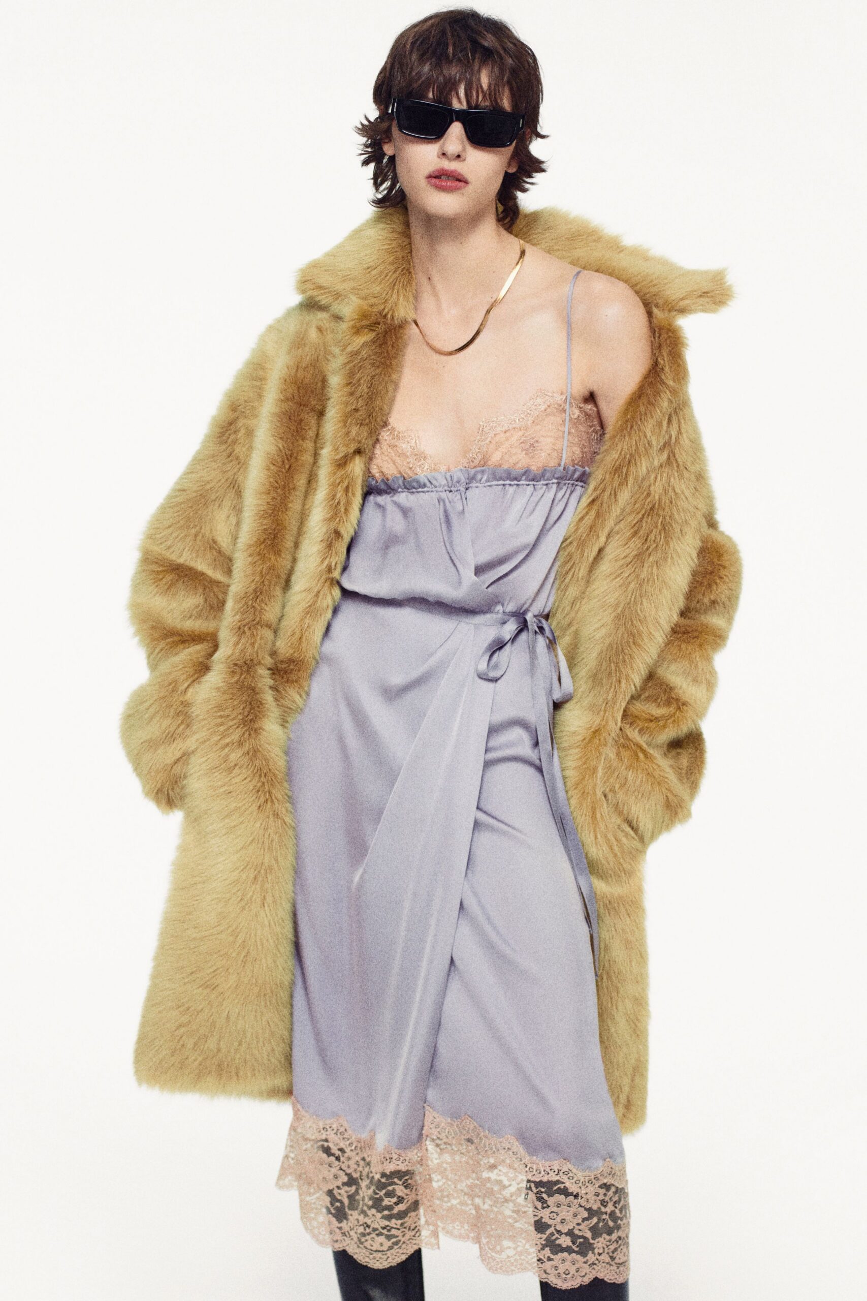 brown faux-fur coat and lavender dress