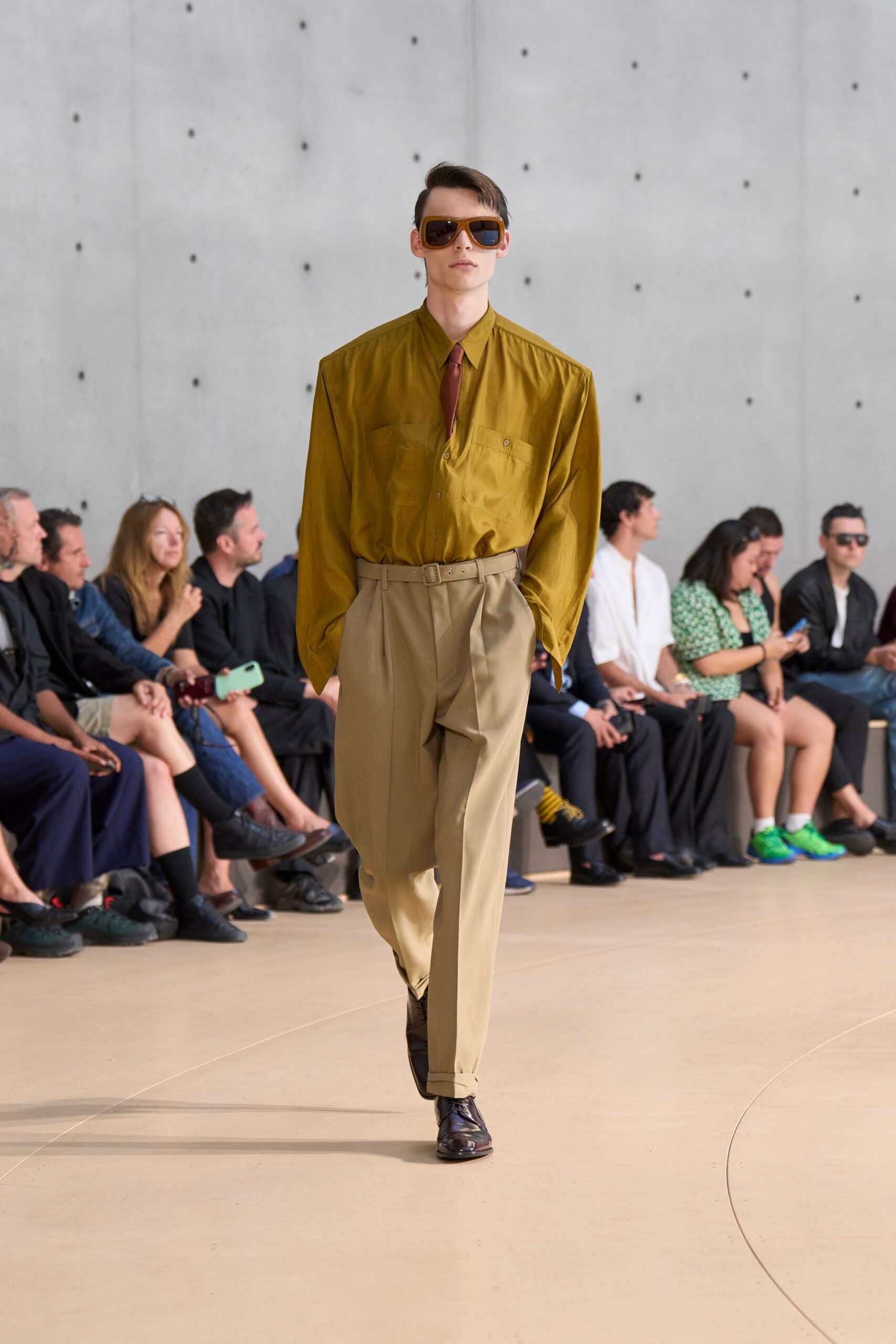 green relaxed shirt beige tailored pants
