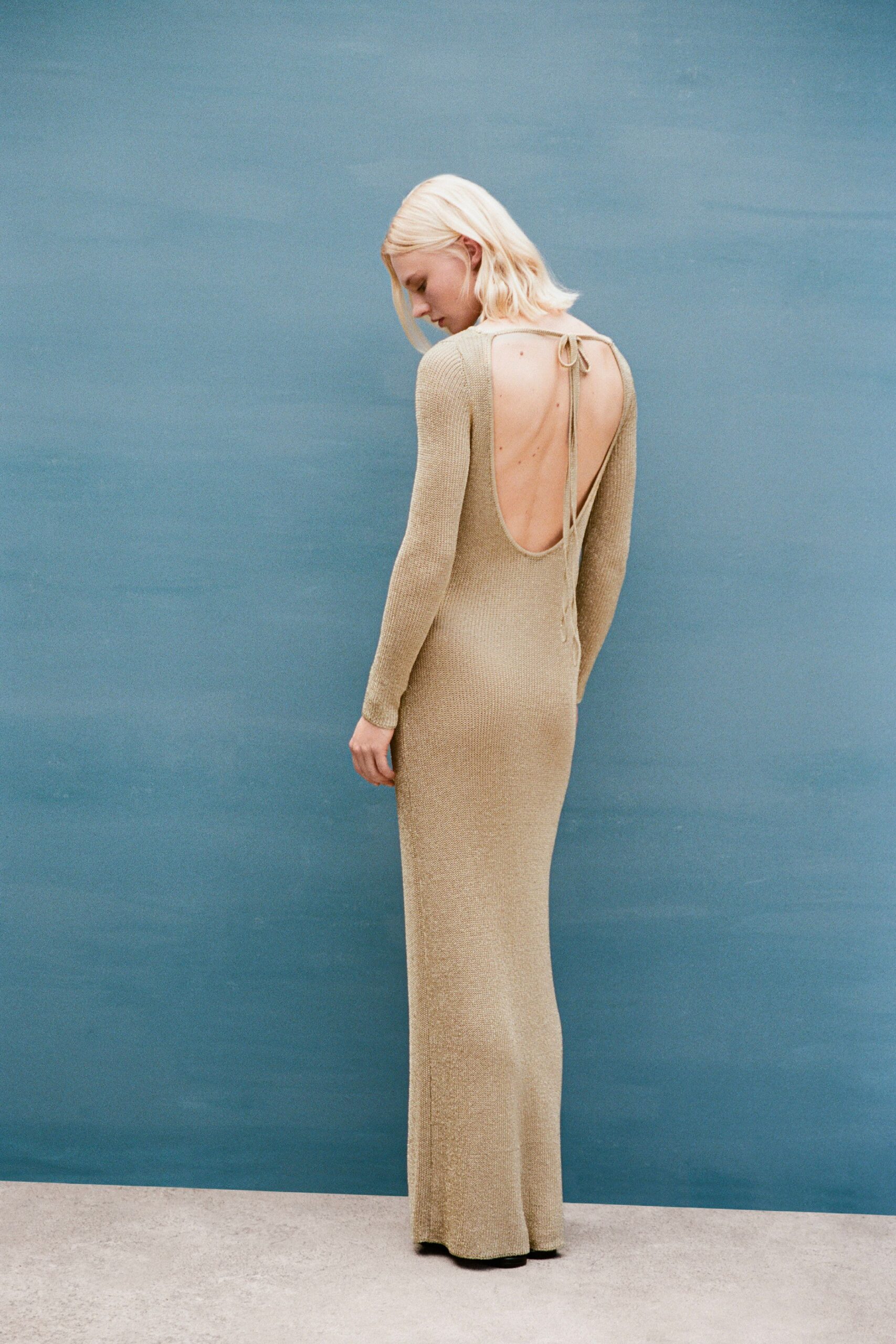 fitted gold knit backless gown