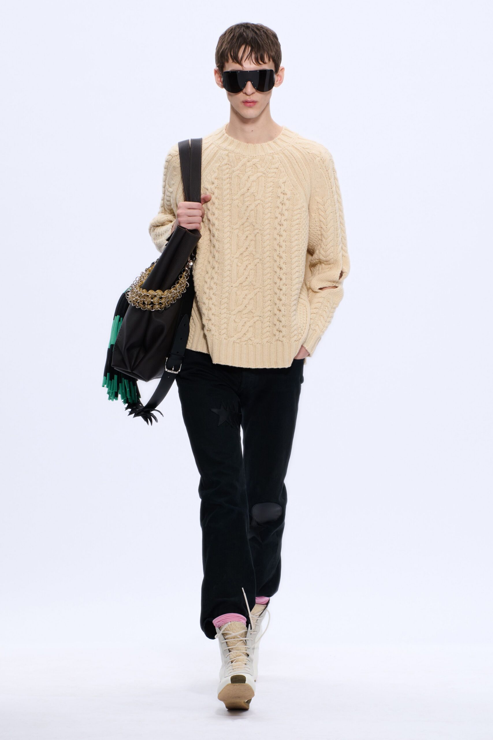 beige knit sweater with black pants