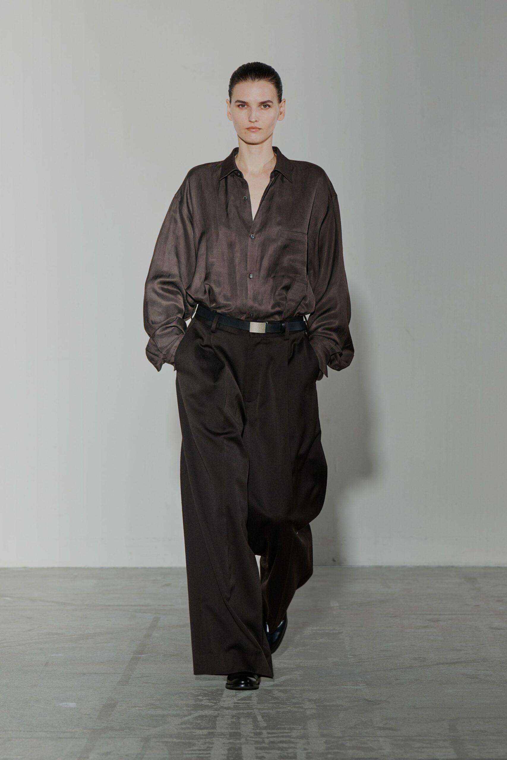 black silk shirt with wide-leg pants
