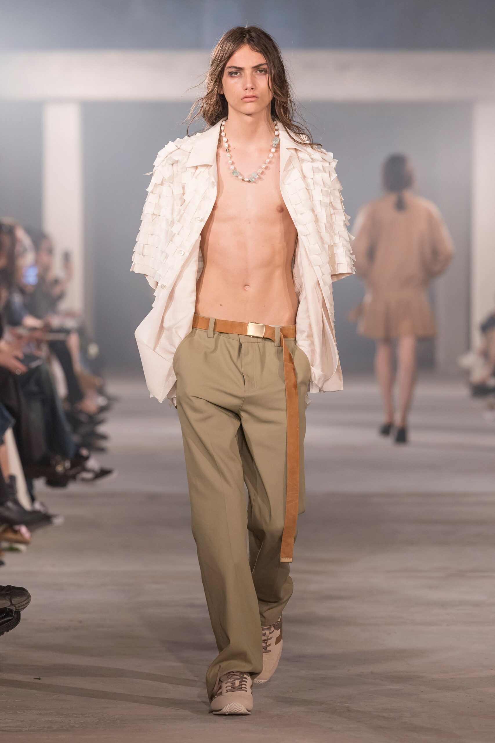 white pleated shirt beige pants