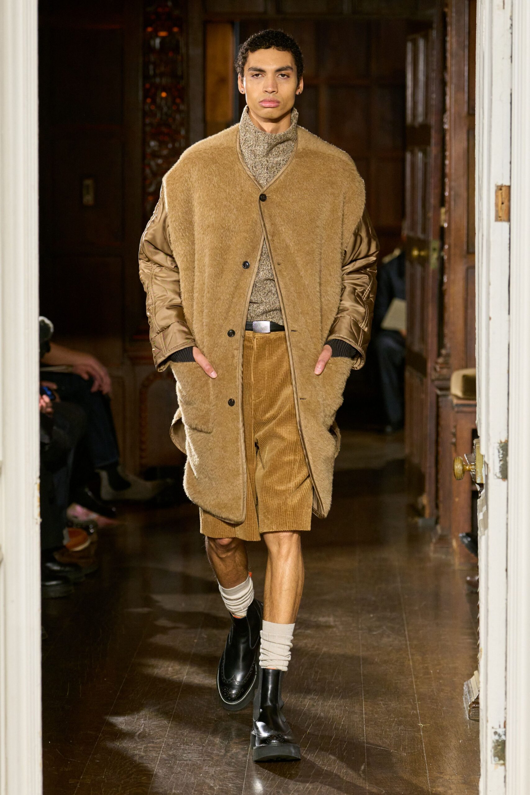 brown faux-fur coat with beige sweater