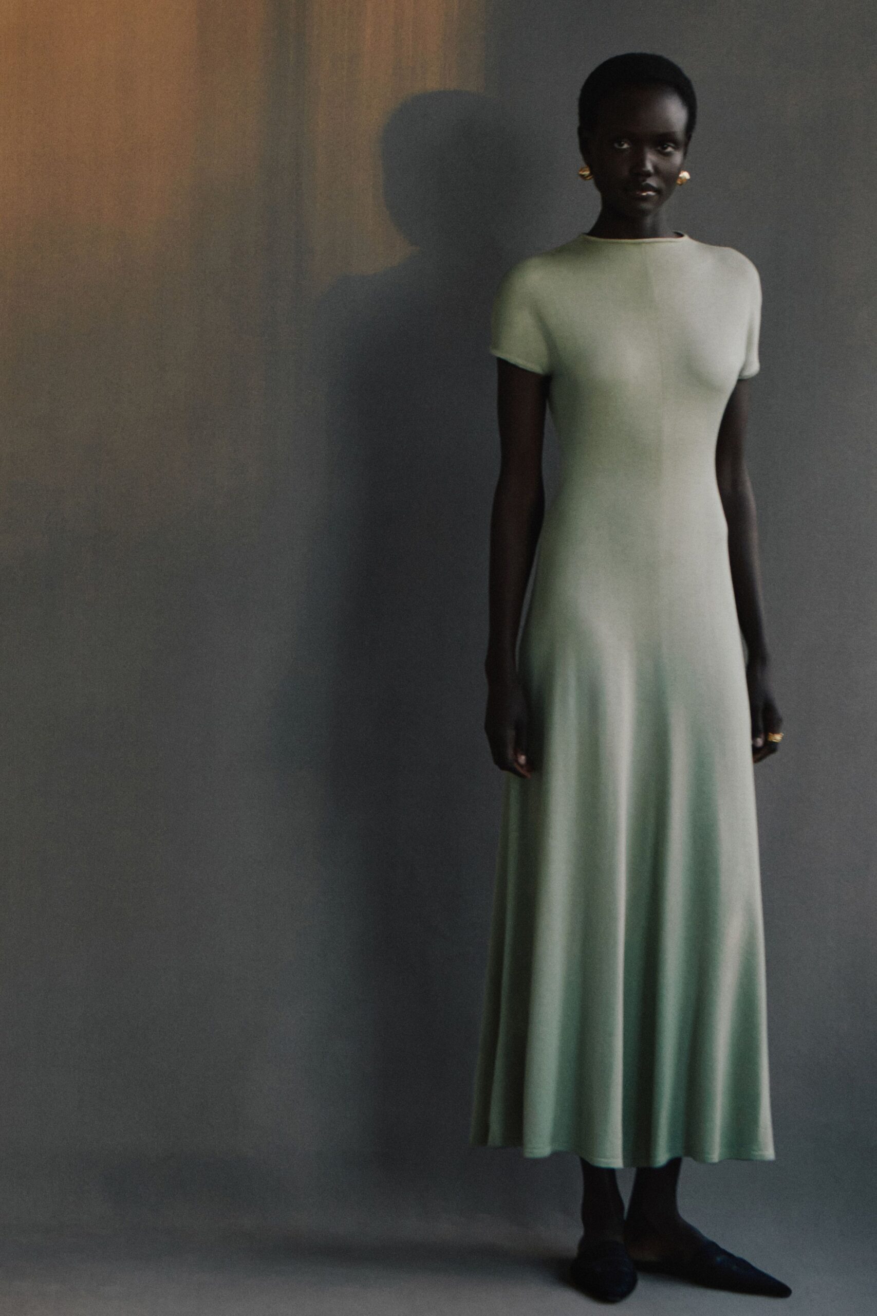 green cotton short-sleeve high-neck fitted flared maxi dress
