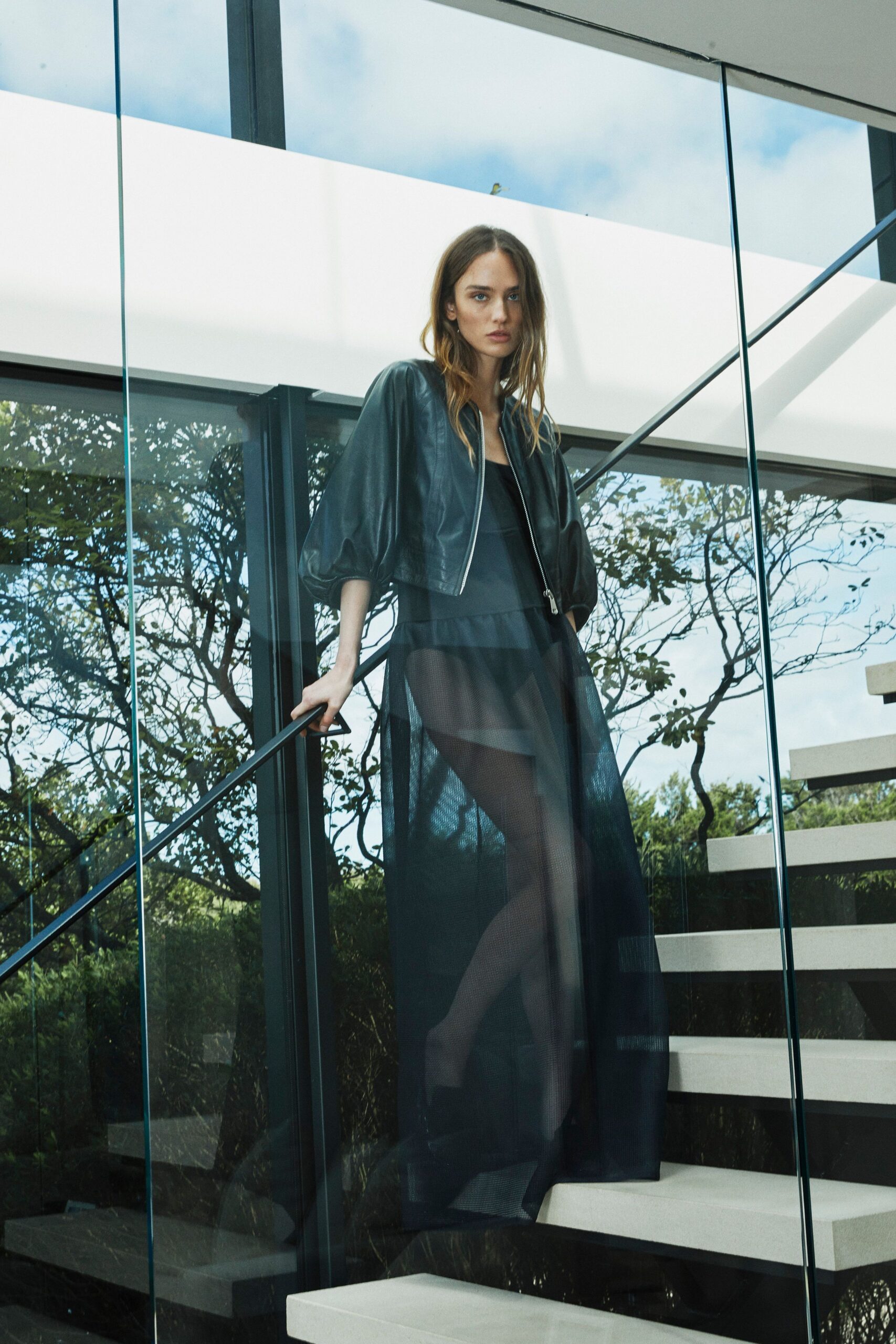 black sleeveless v-neck fitted layered a-line dress