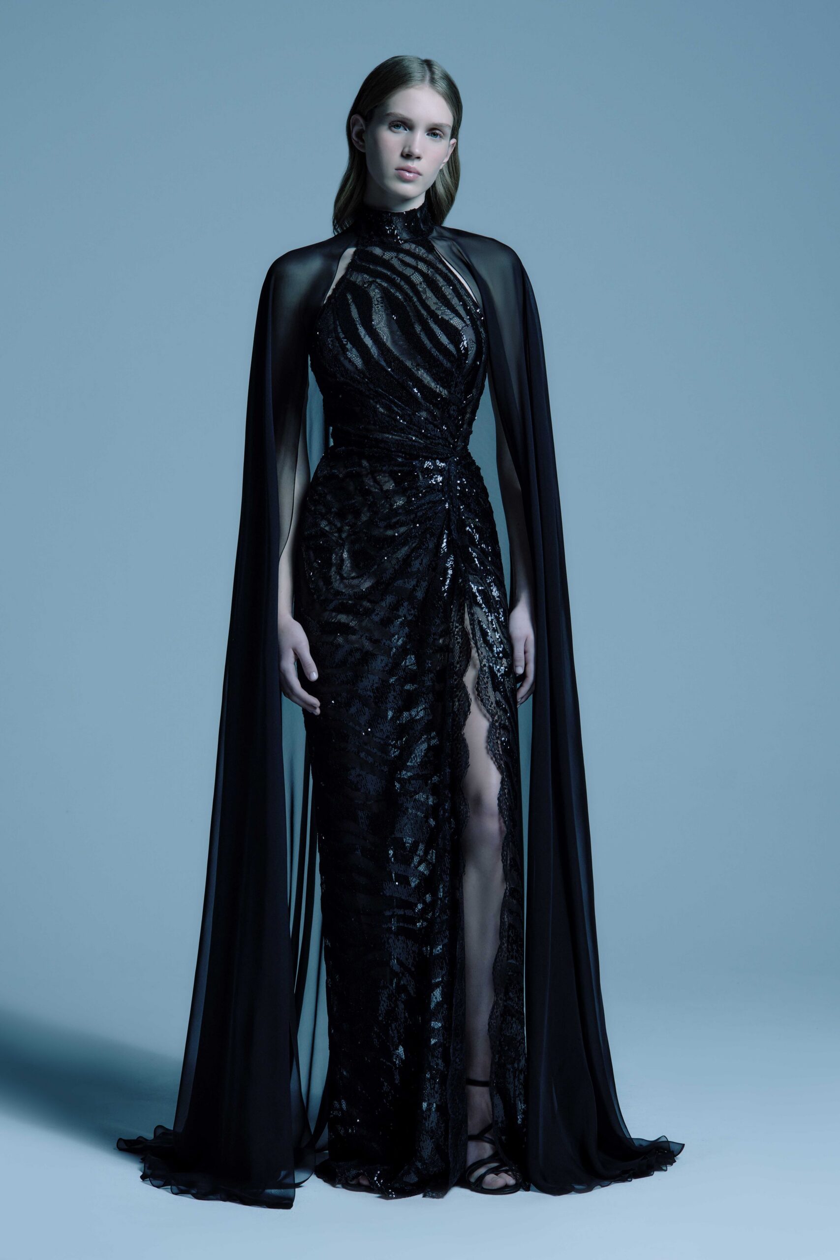 black silk long-sleeve high-neck fitted sequined flowing gown