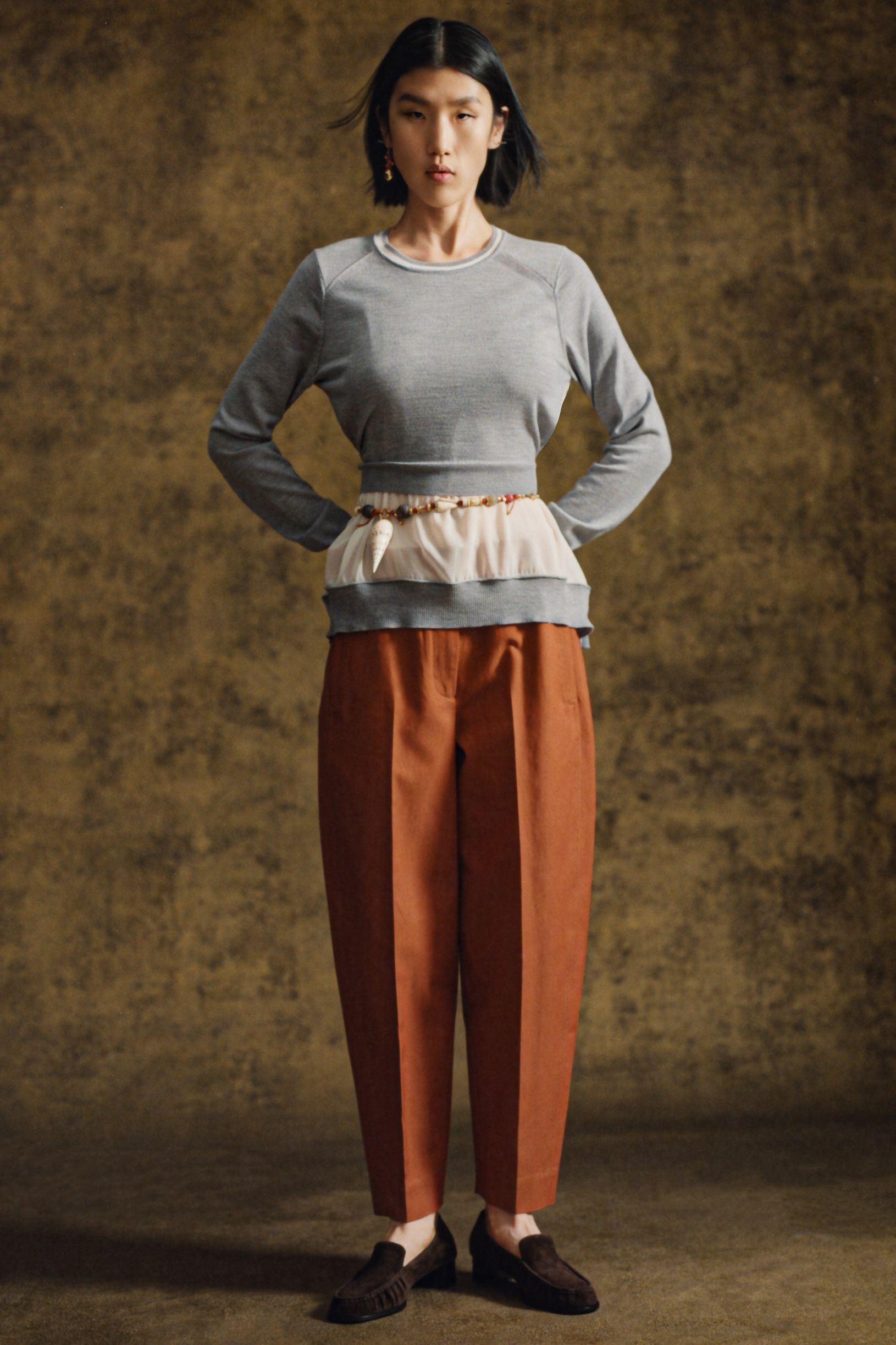 gray sweater brown pants