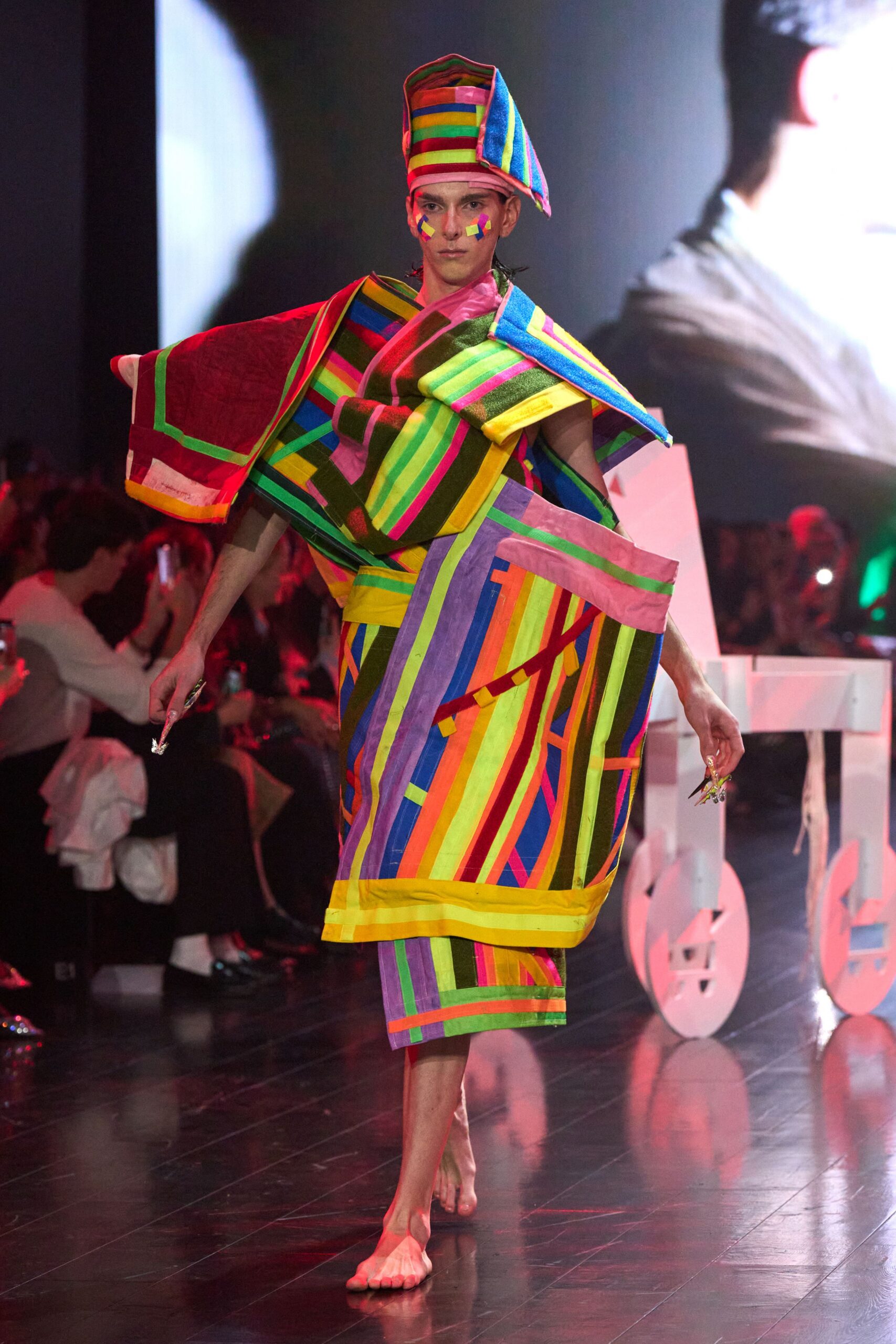 multi-colored layered dress and hat