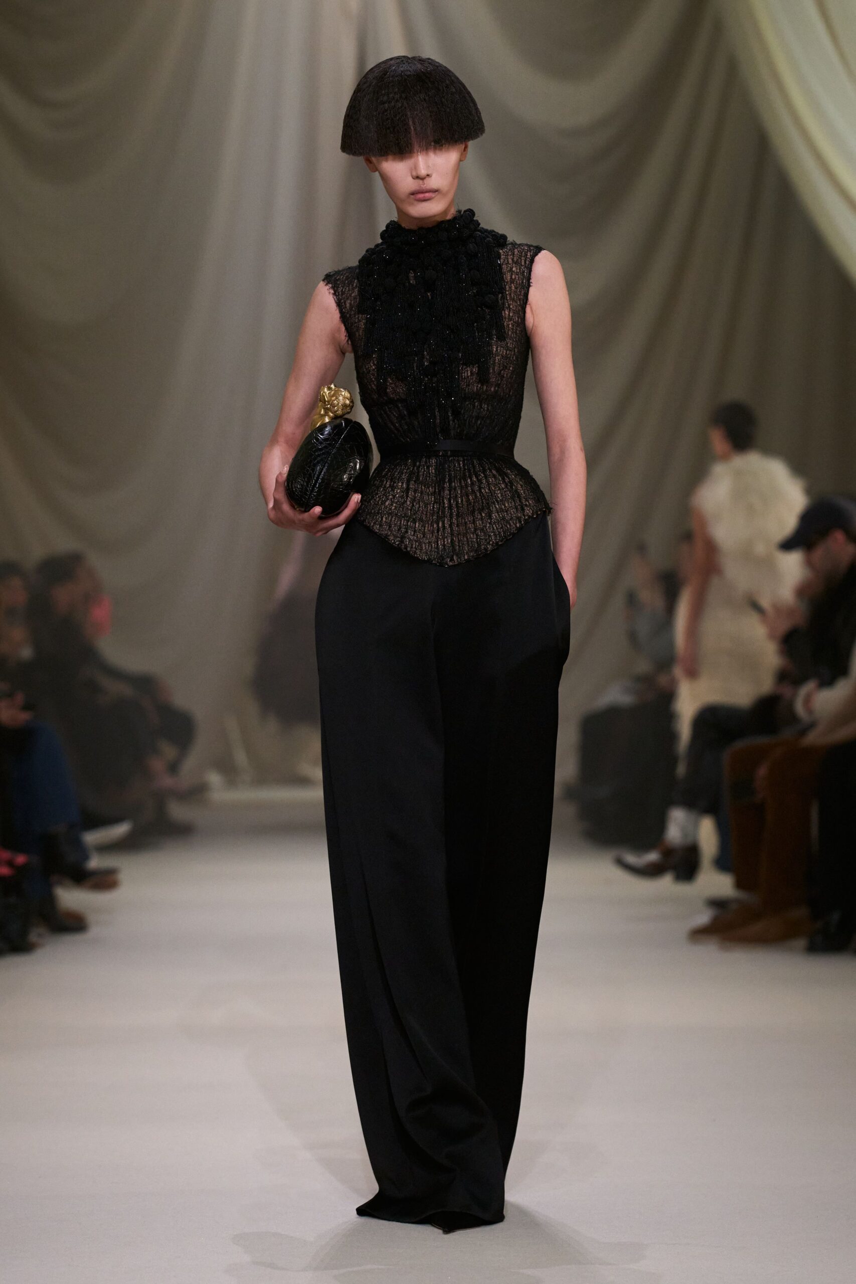 black fitted top with relaxed pants