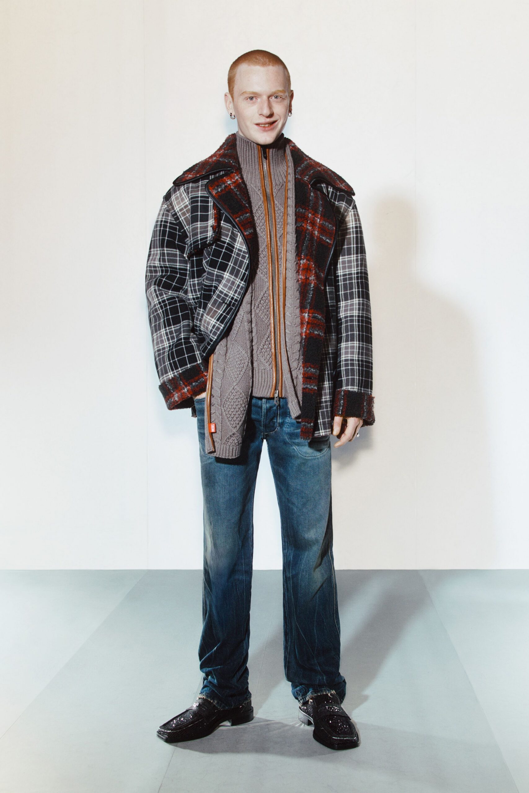 checked jacket gray sweater denim pants