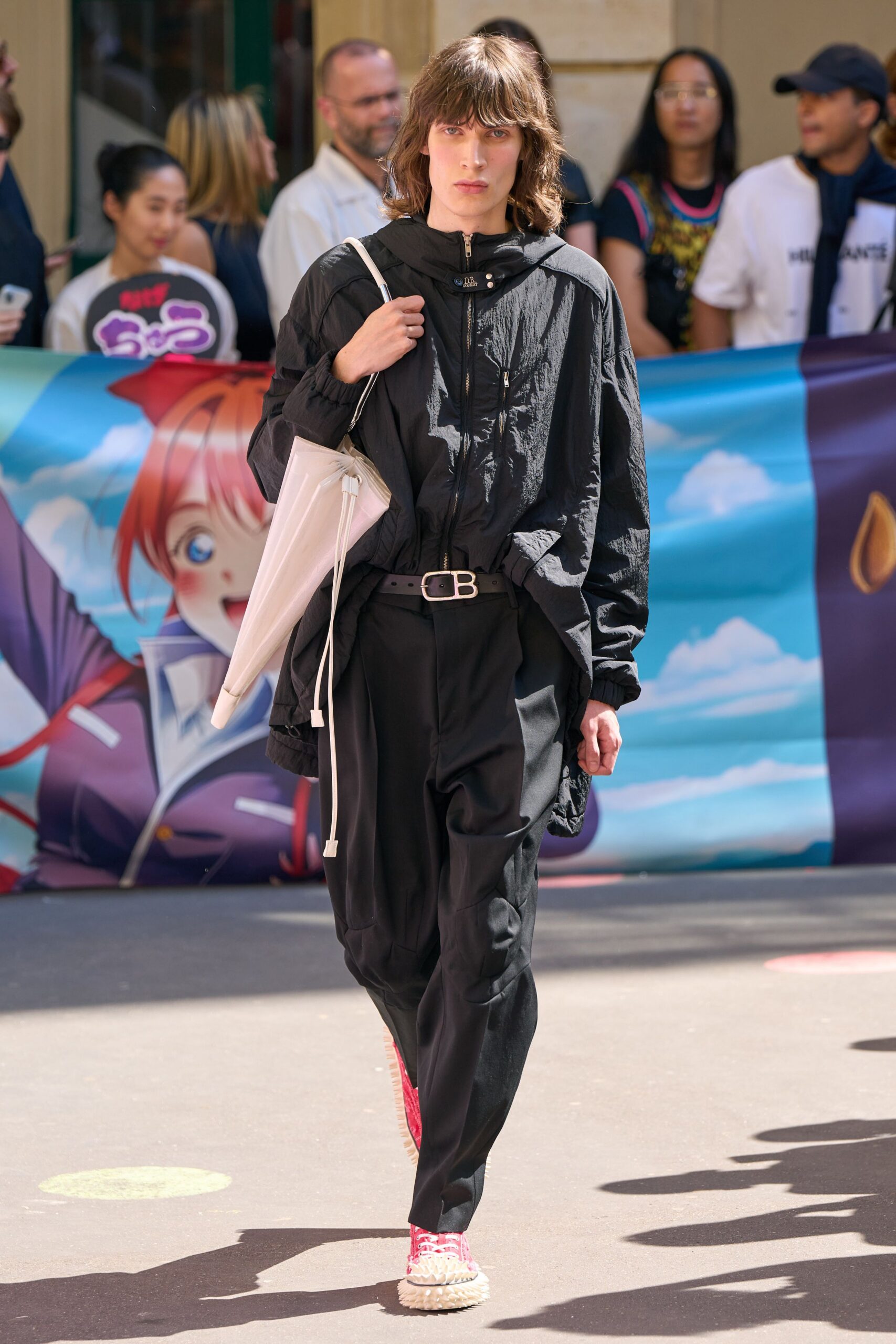 black relaxed jacket with pleated pants