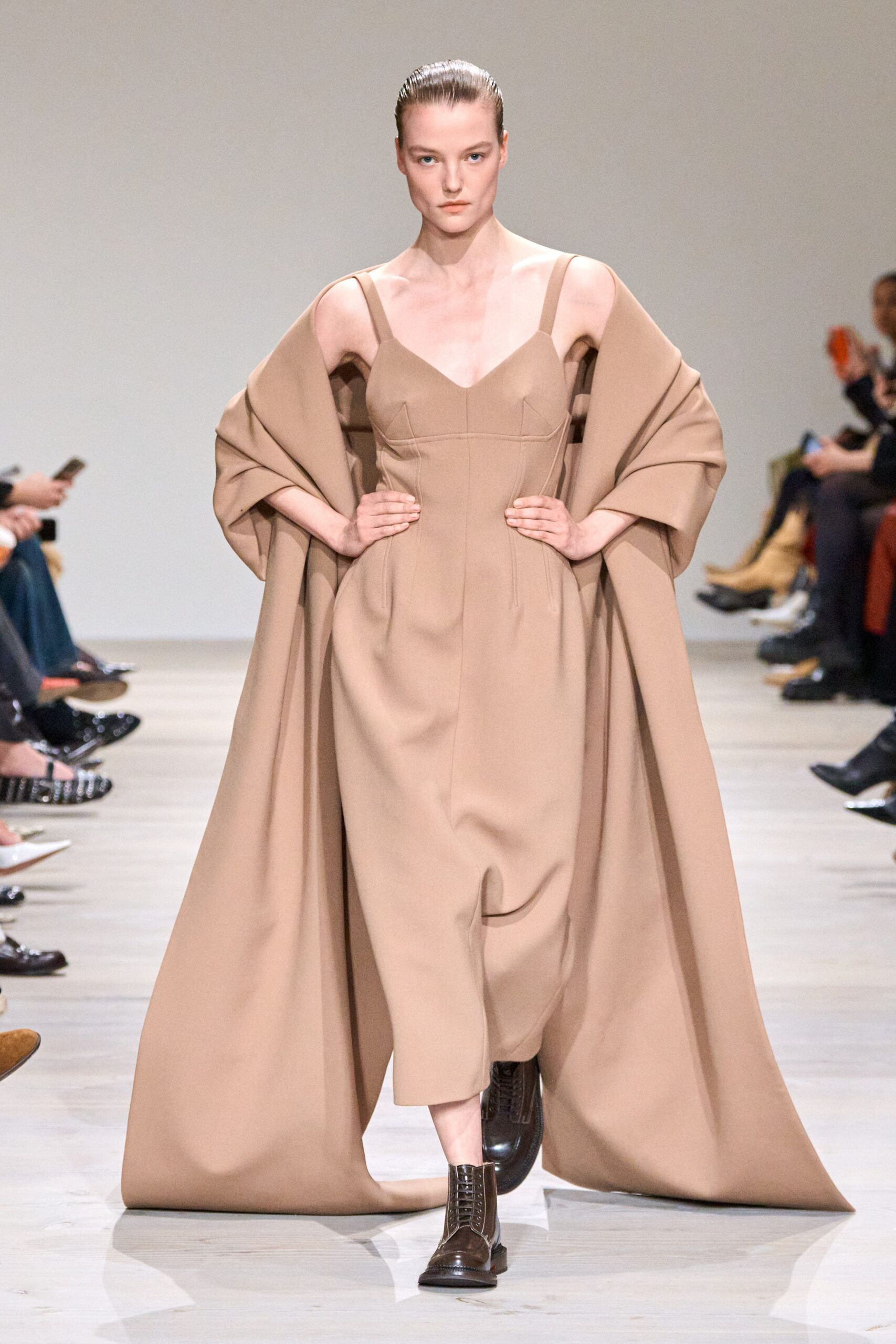 beige wool sleeveless v-neck fitted draped midi gown