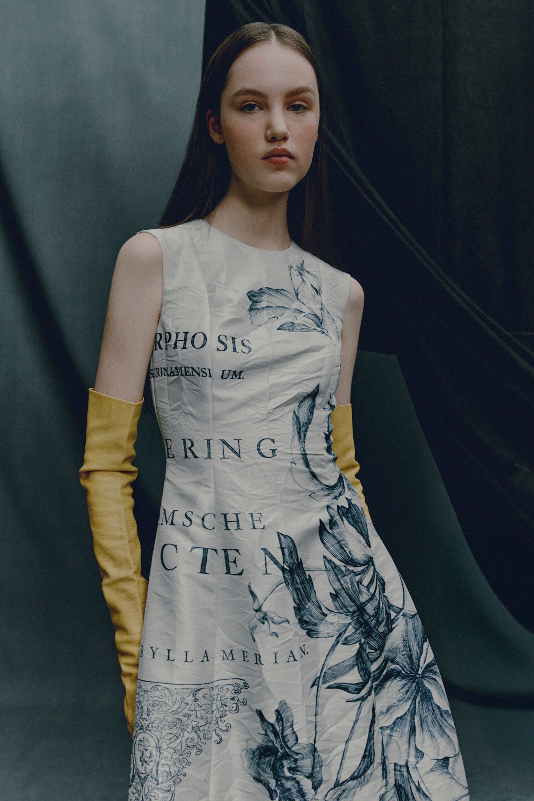 white cotton sleeveless high-neck fitted printed mini dress