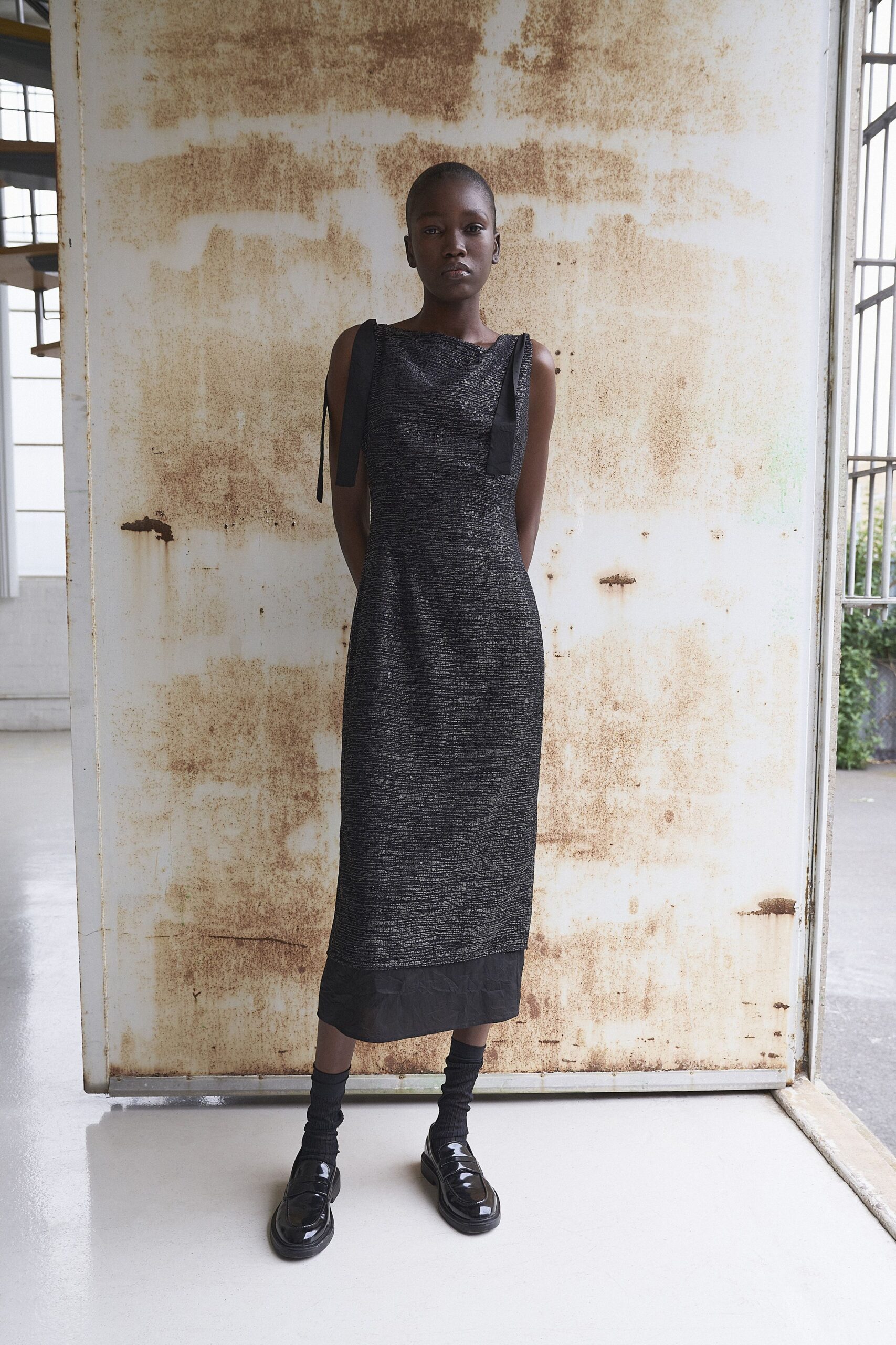 black textured midi dress and shoes