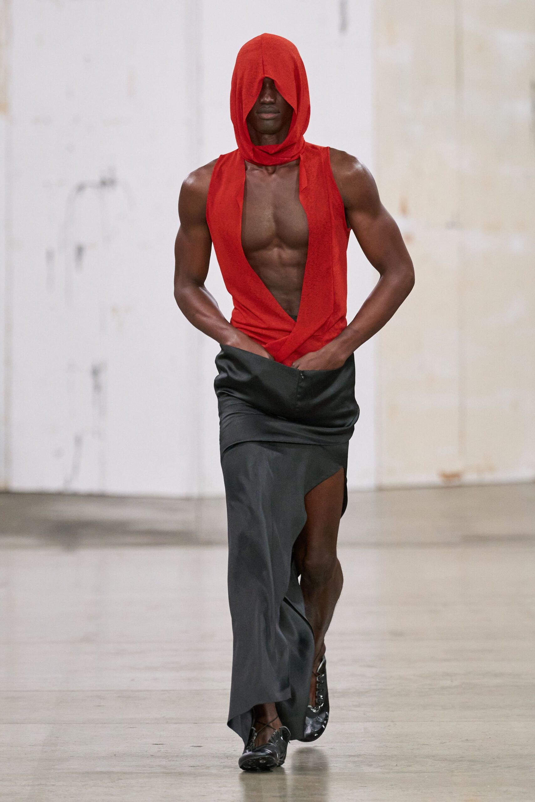 red cotton sleeveless v-neck fitted draped top