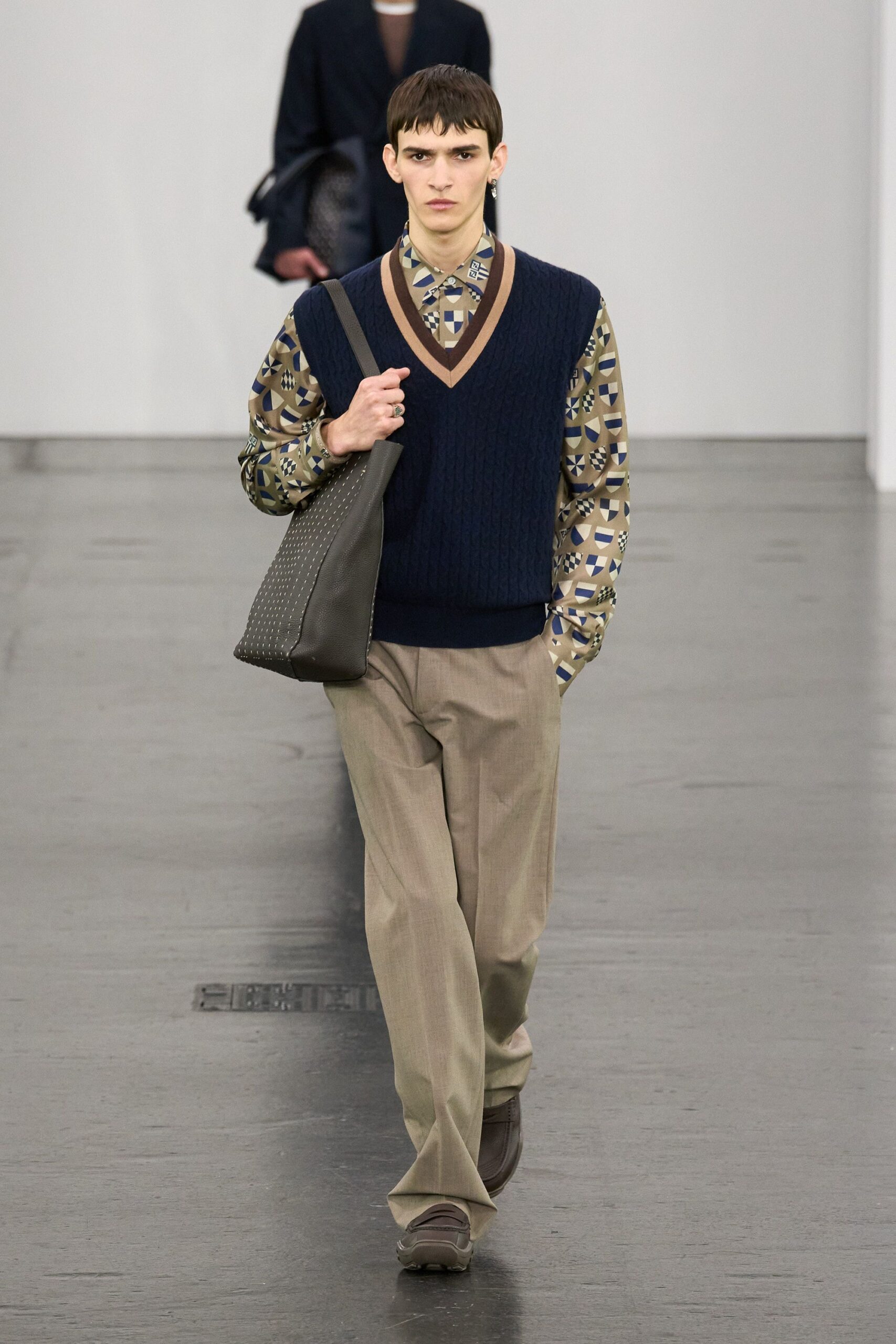 navy sweater multi shirt beige pants