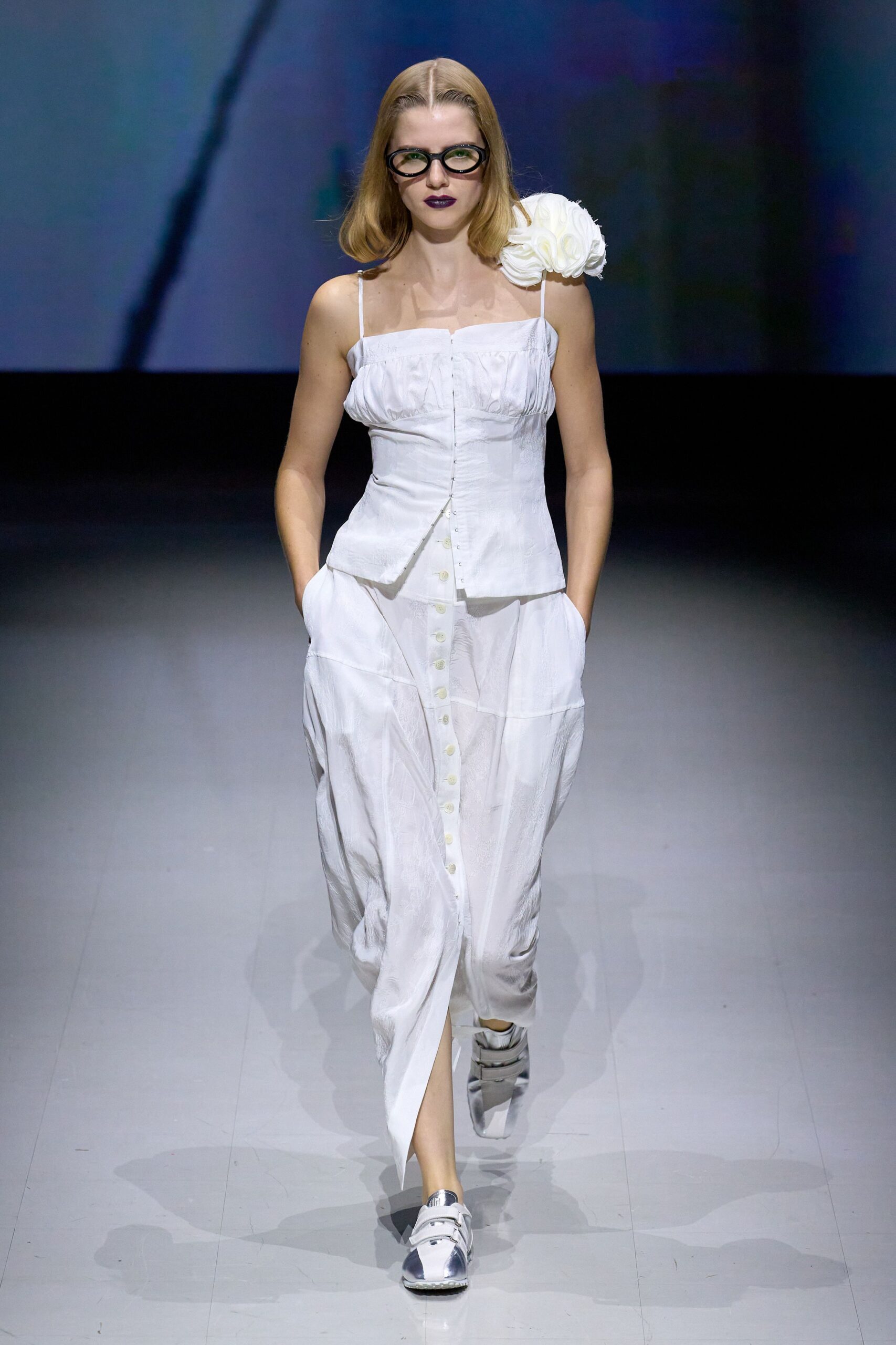 white cotton sleeveless v-neck fitted buttoned pleated dress