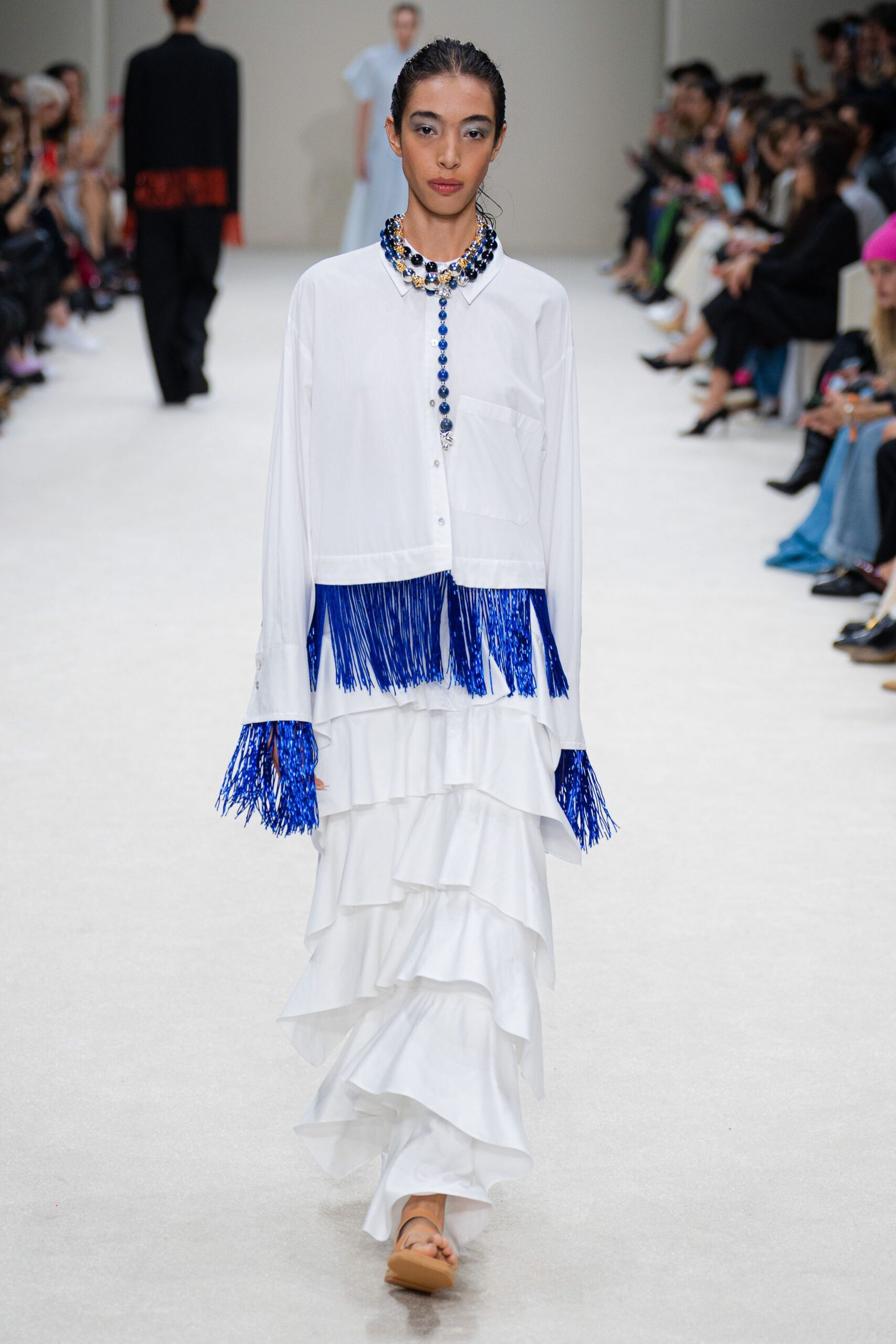 white tiered skirt with shirt