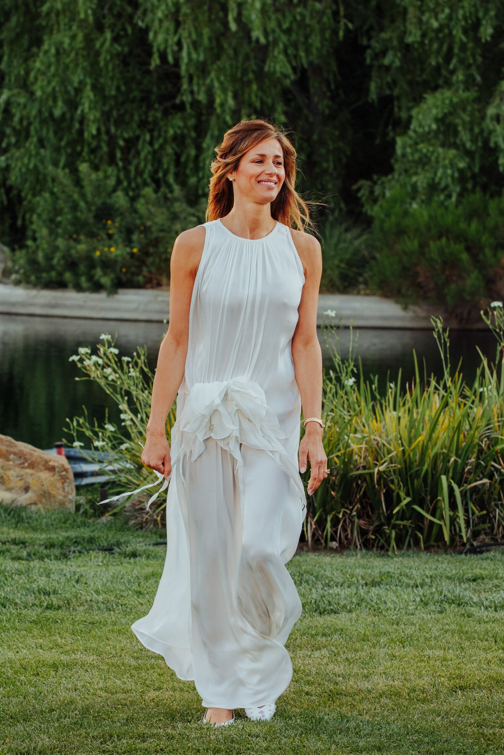 white flowing sleeveless dress