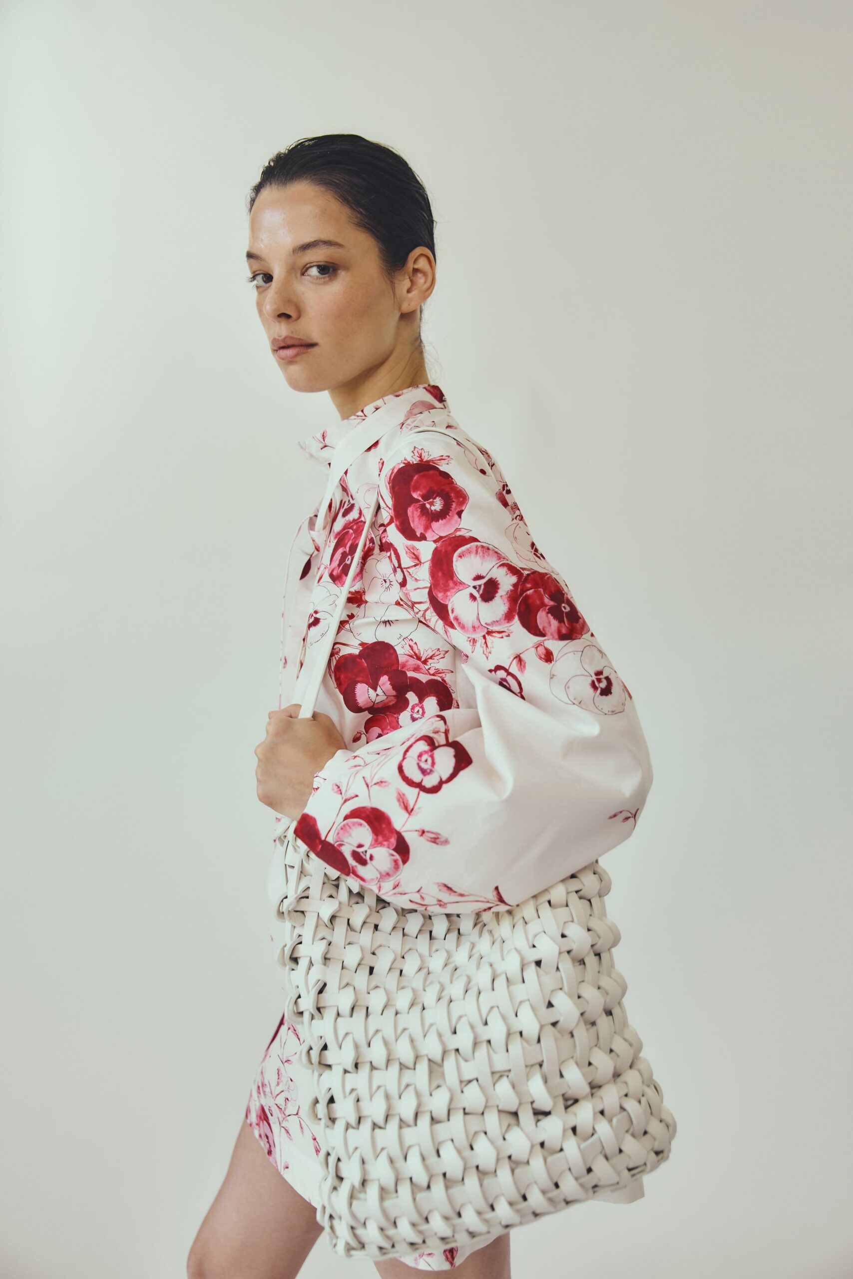 floral mini dress with woven bag