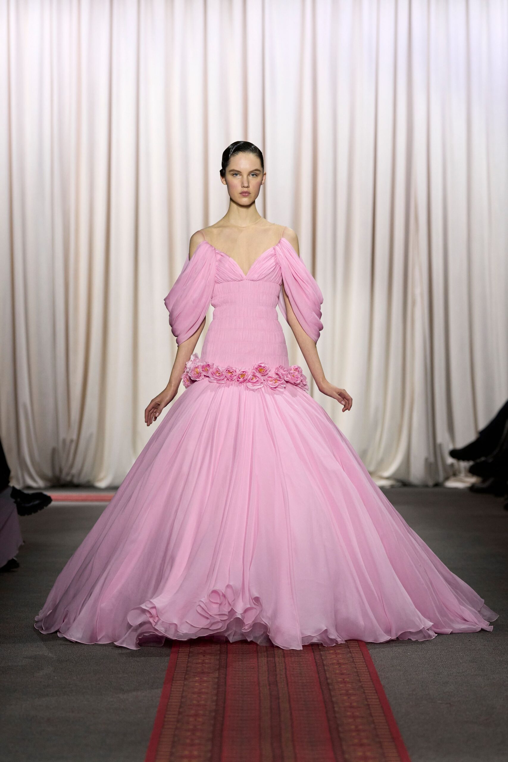 pink off-shoulder flowing gown