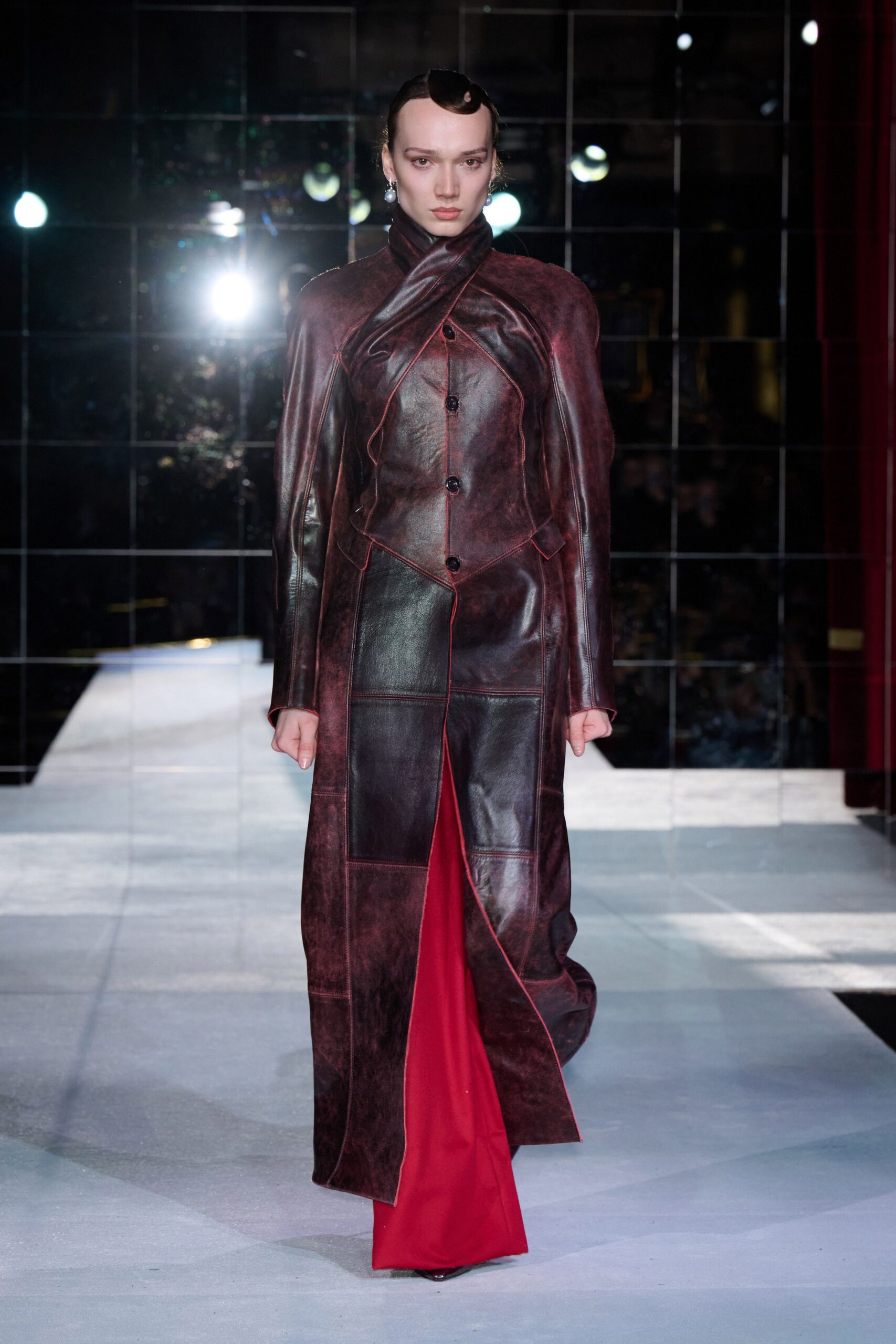 red leather long-sleeve collared fitted buttoned draped coat