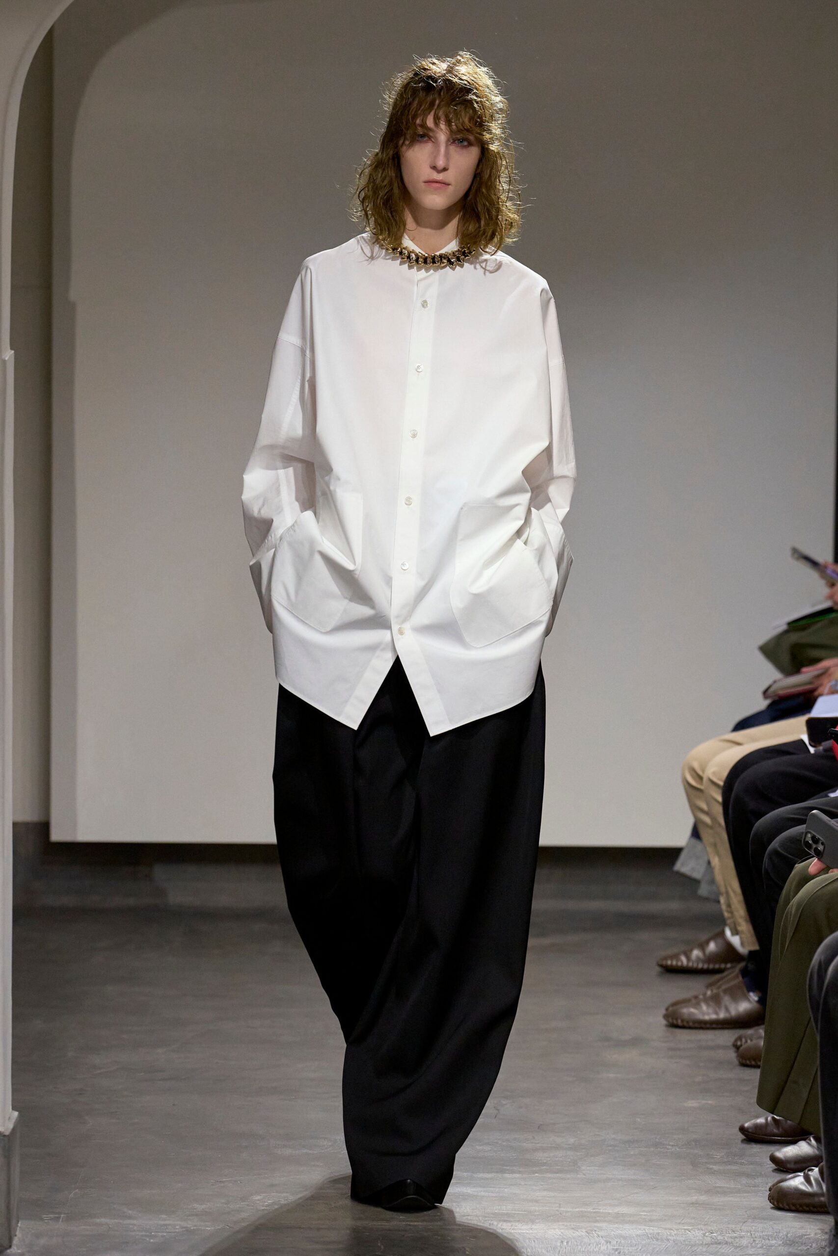 white cotton long-sleeve collared oversized buttoned shirt