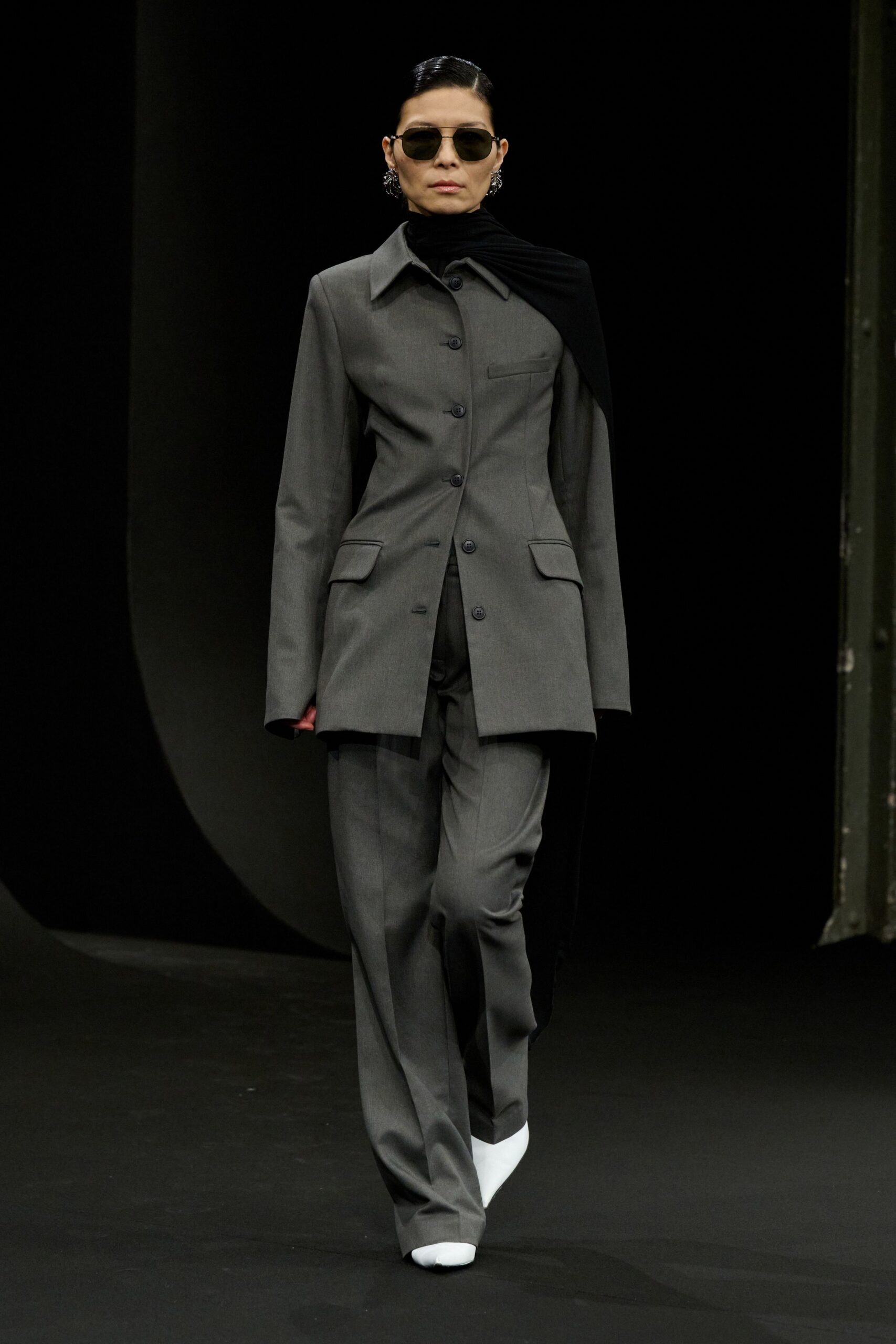 gray tailored suit with sunglasses