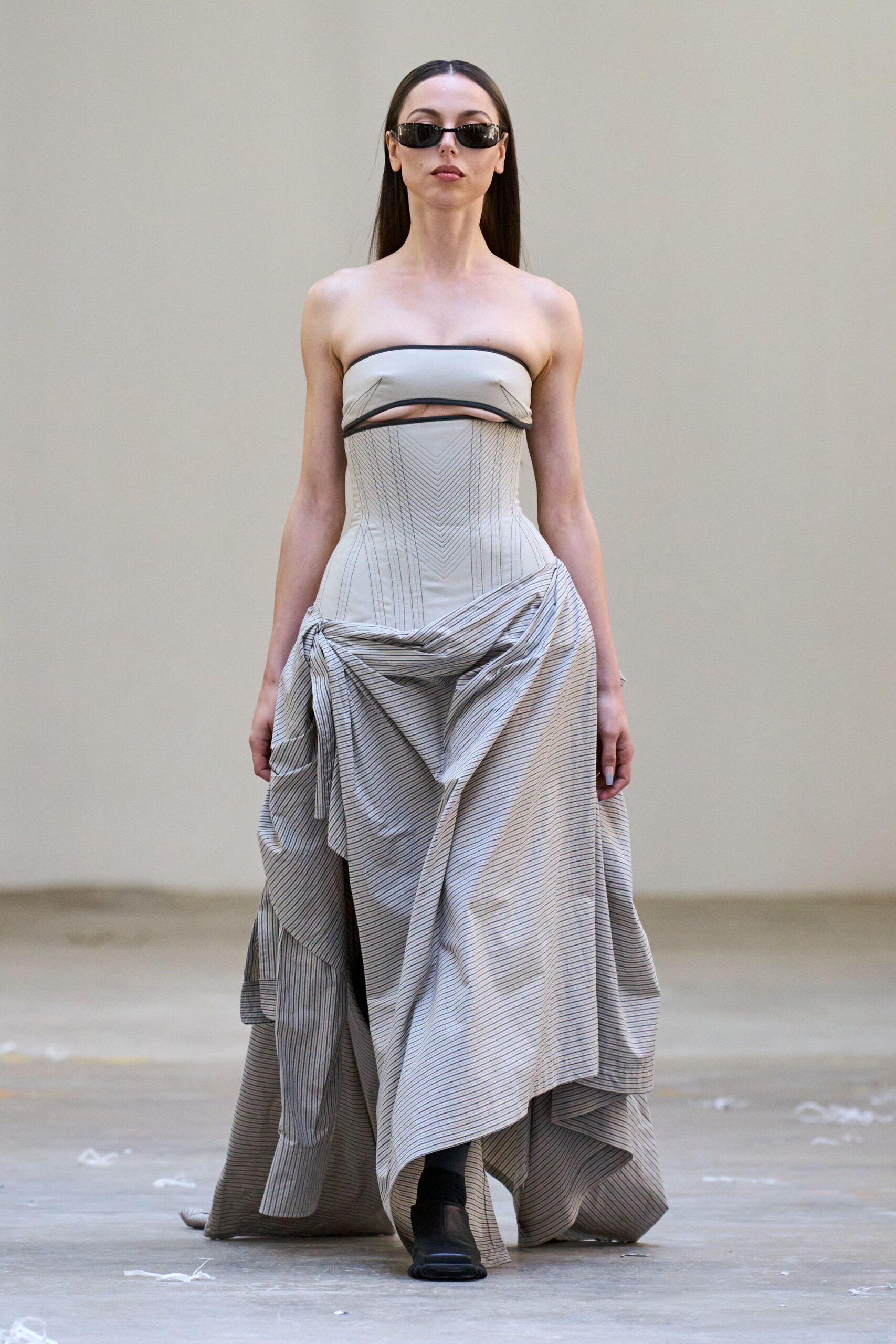 beige cotton strapless fitted pleated draped flowing gown