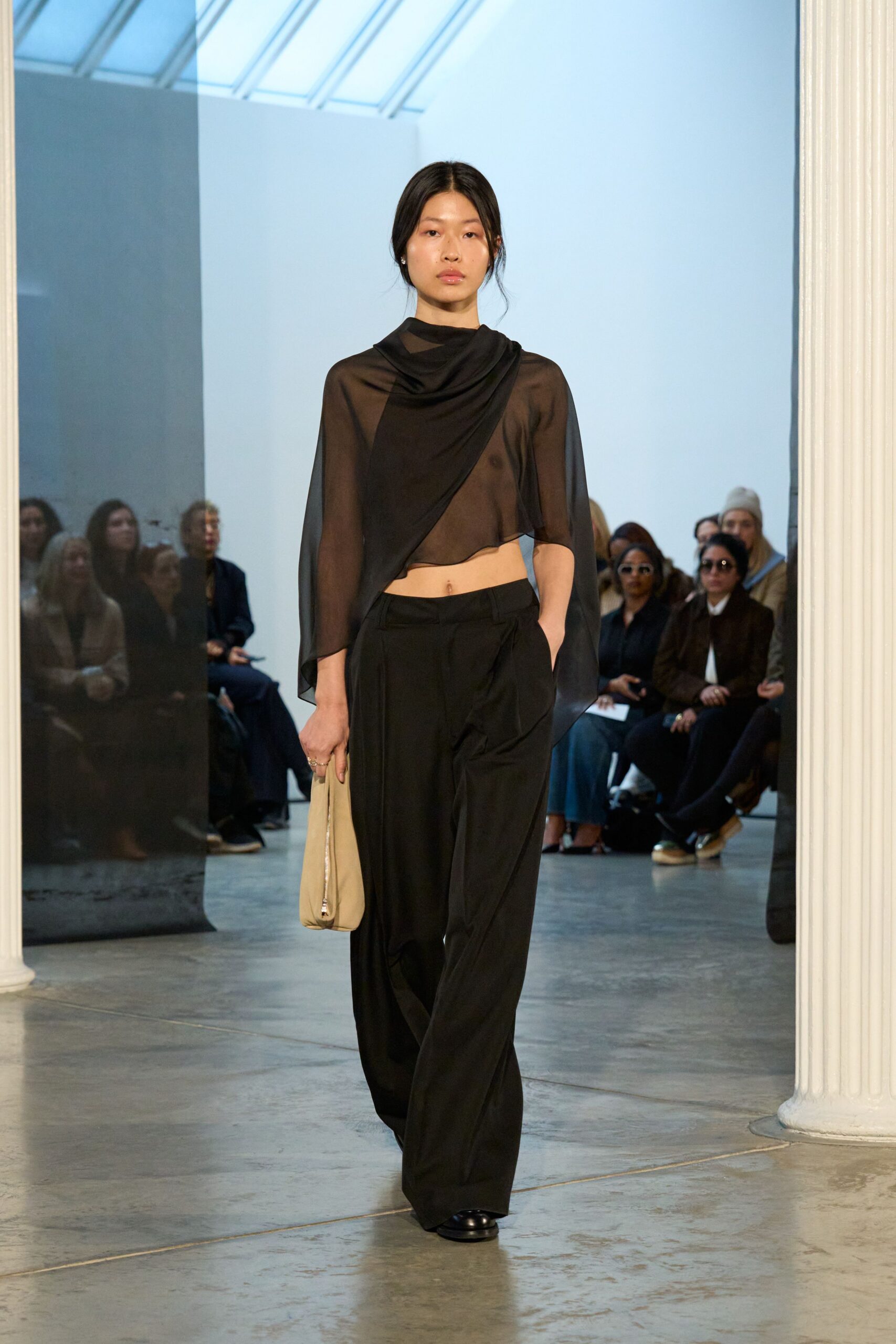 black silk asymmetric top with relaxed pants