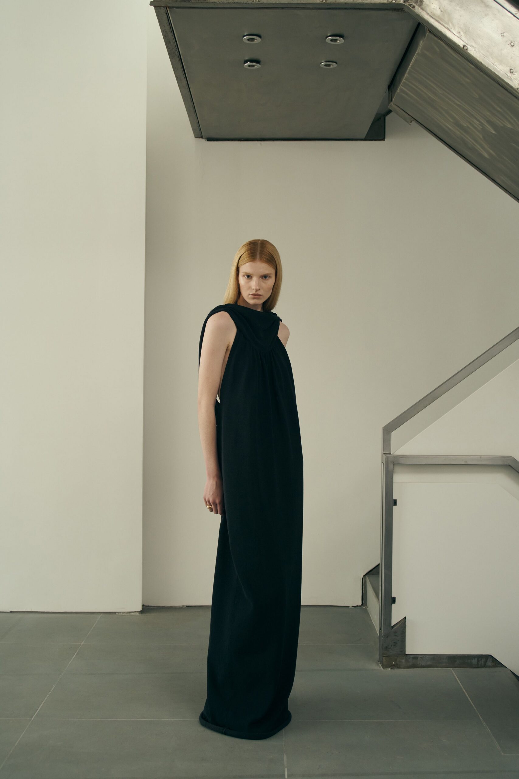 black wool sleeveless gown