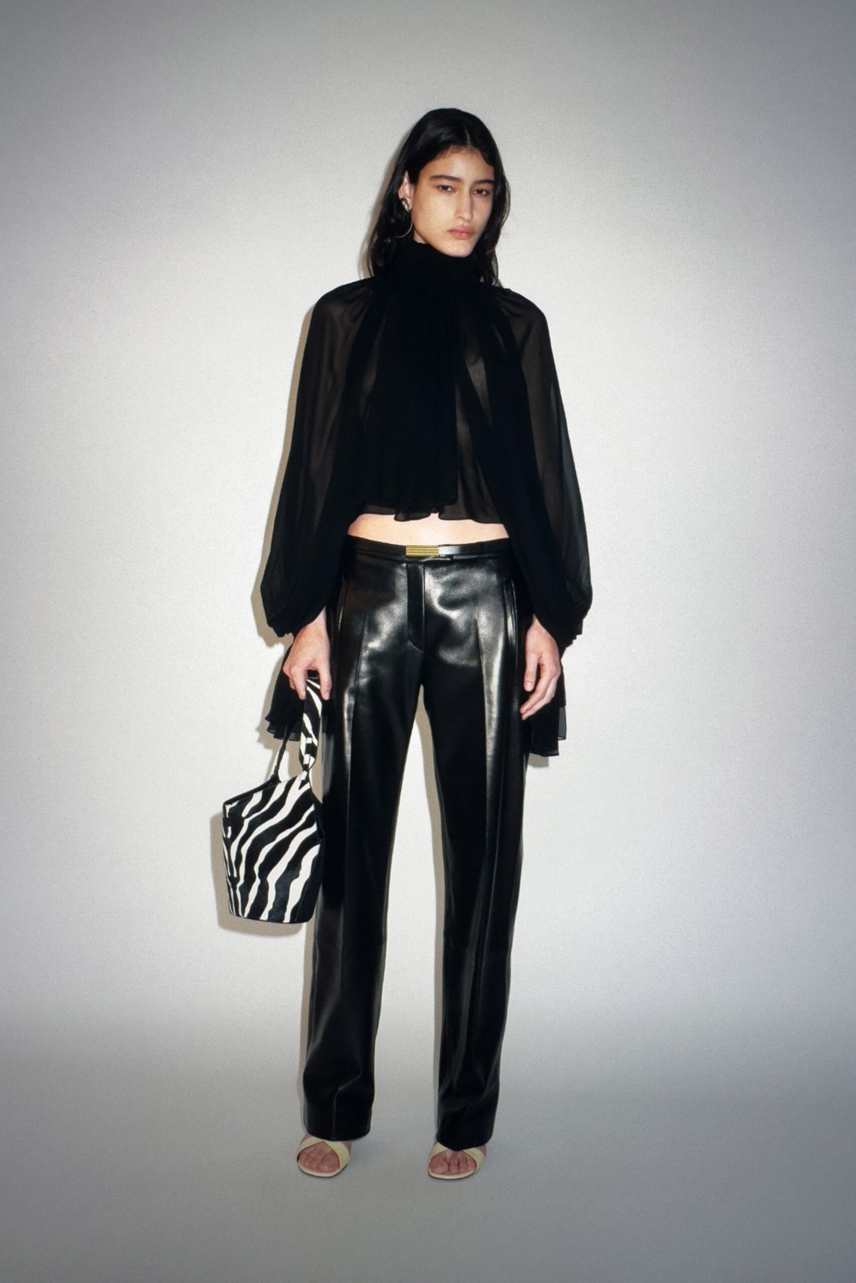 black silk top with leather pants