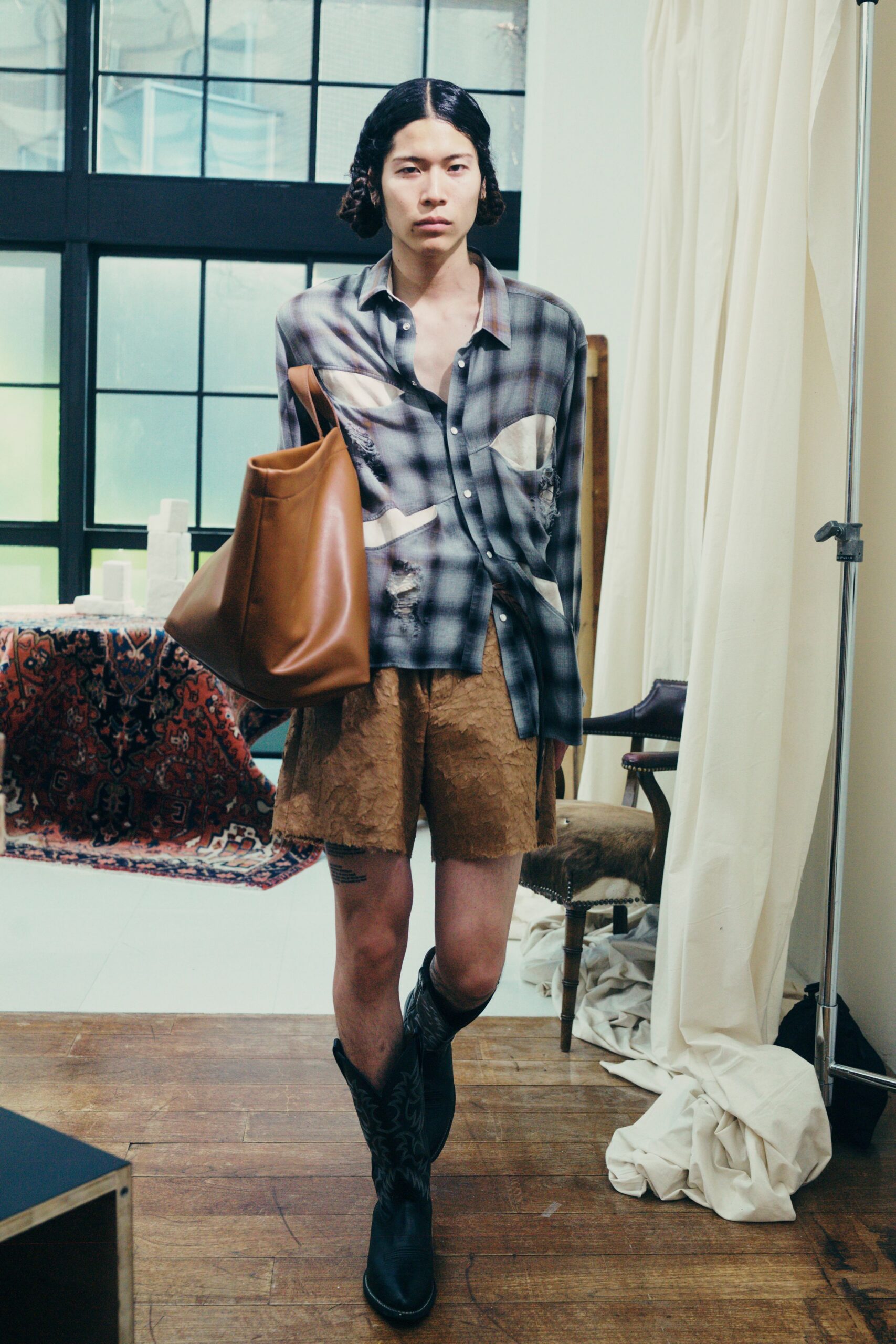 gray checked shirt with brown shorts