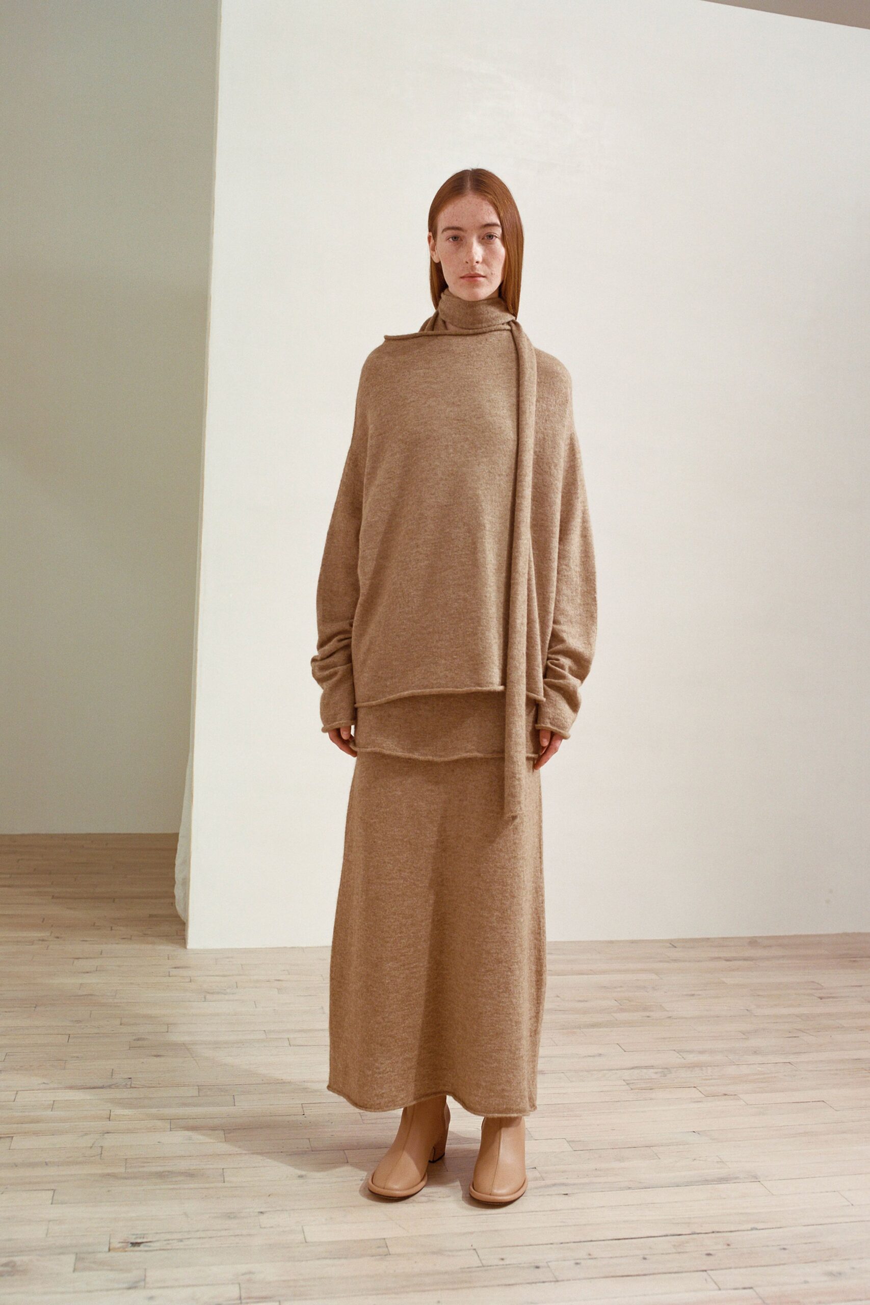beige wool top and skirt with tan boots