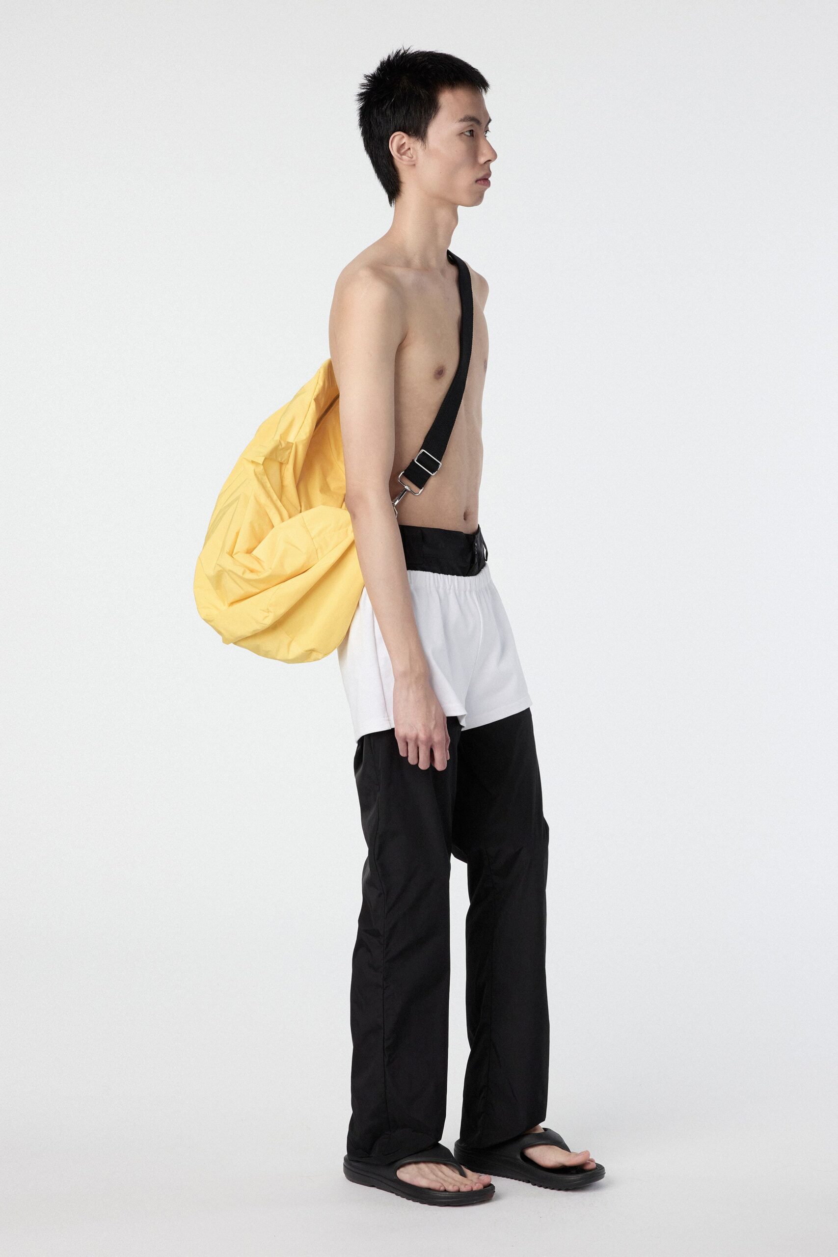black relaxed pants and white shorts