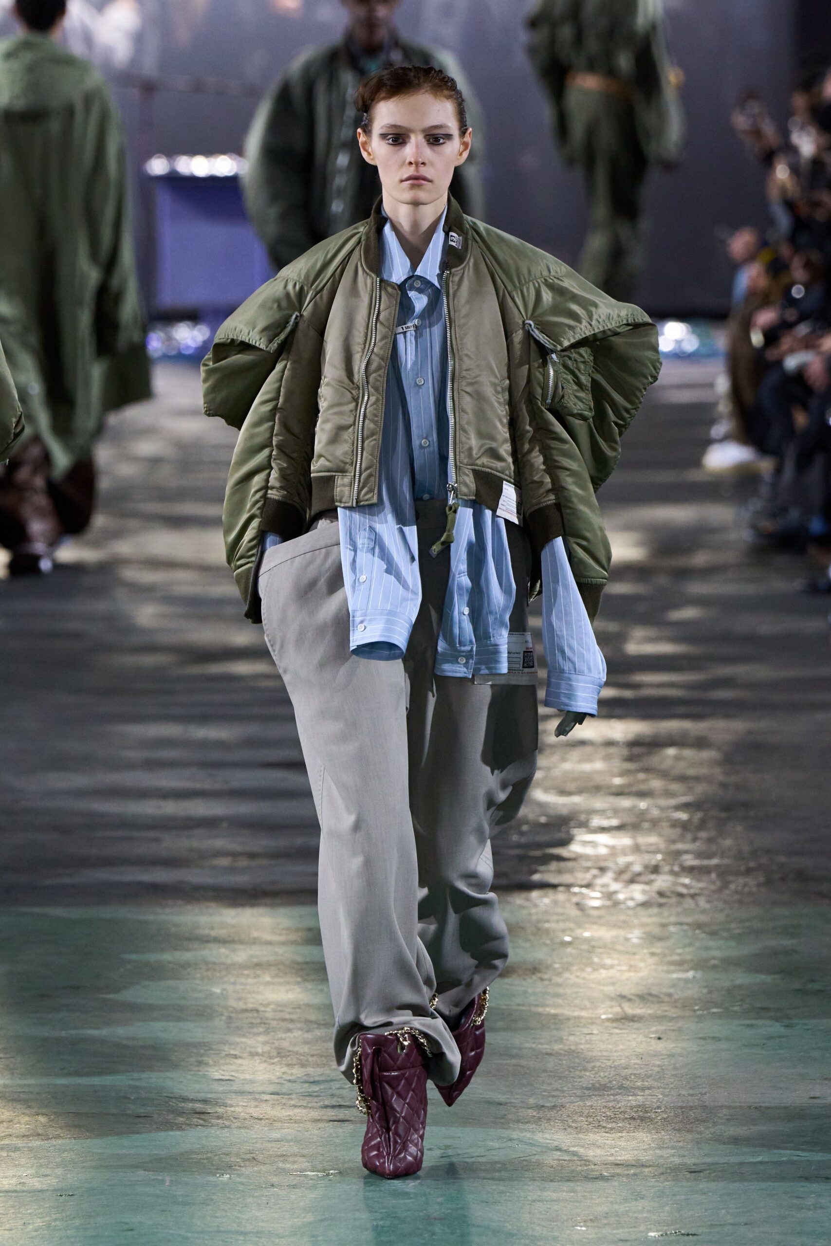 oversized green jacket with blue shirt