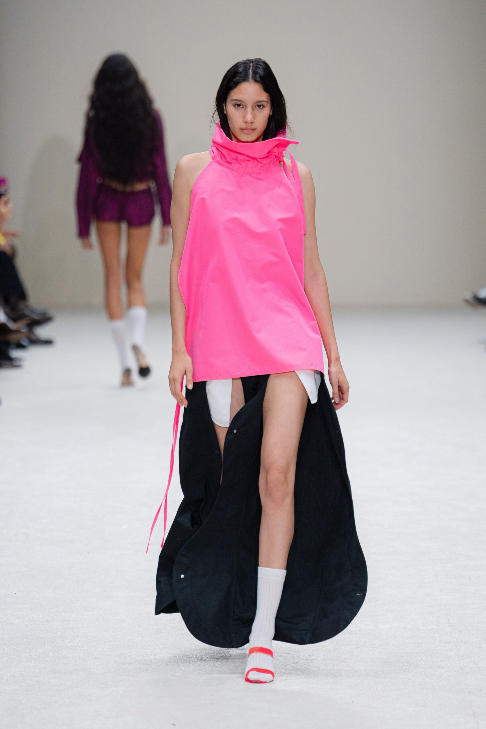 pink relaxed top with black skirt