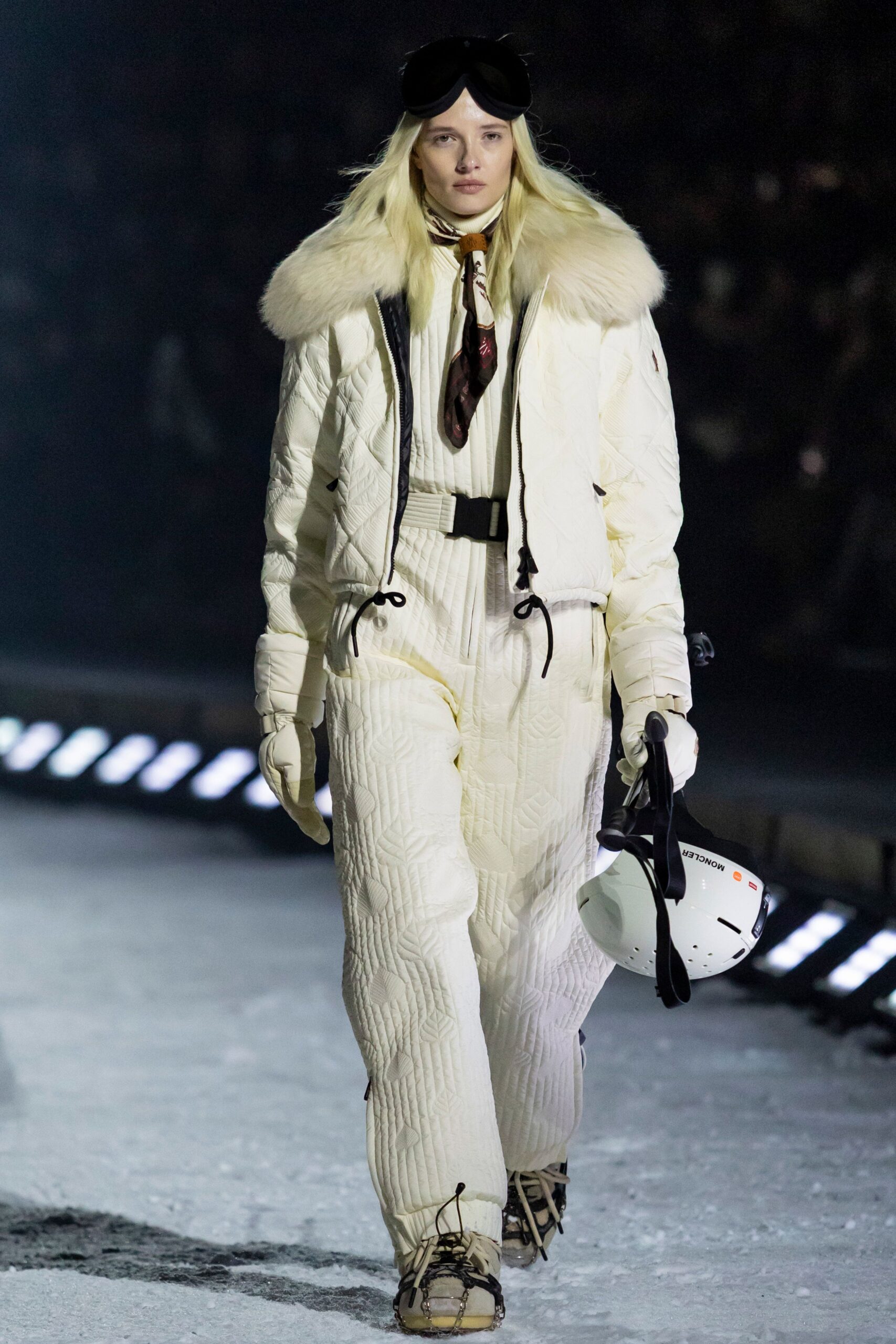 white quilted jumpsuit with gloves