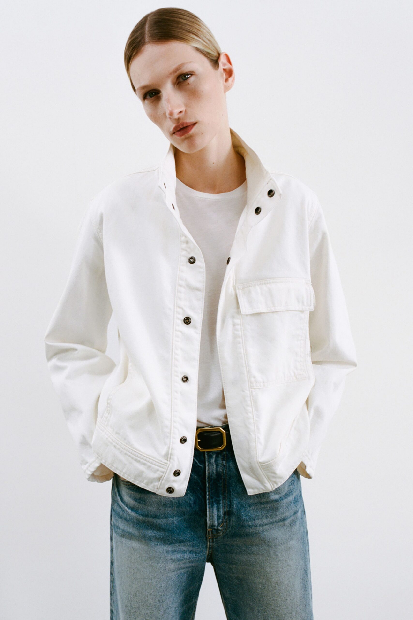 white jacket with t-shirt and jeans