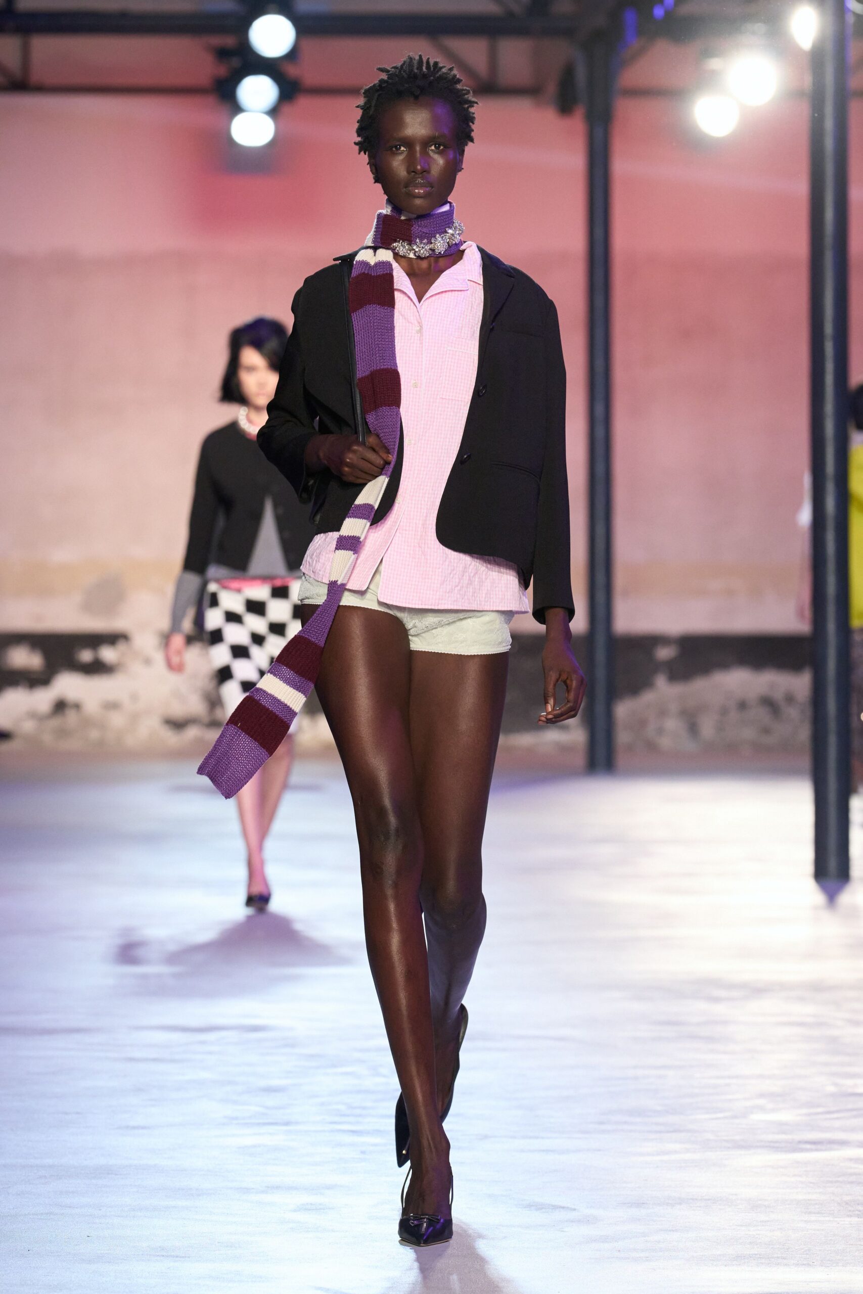black blazer pink shirt white shorts